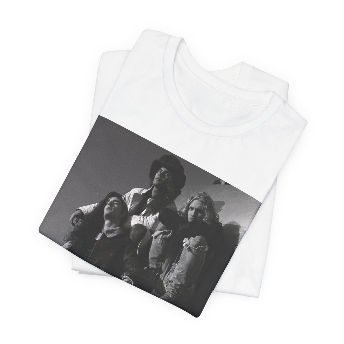 A black graphic t-shirt featuring a 90s black and white photographic portrait of the band Alice In Chains, capturing their iconic grunge look.