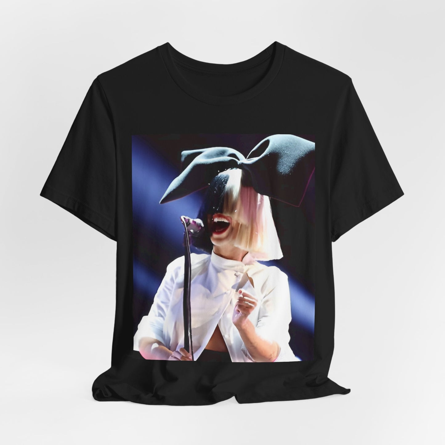 A black graphic t-shirt featuring a graphic related to Sia's 'Elastic Heart' live era.