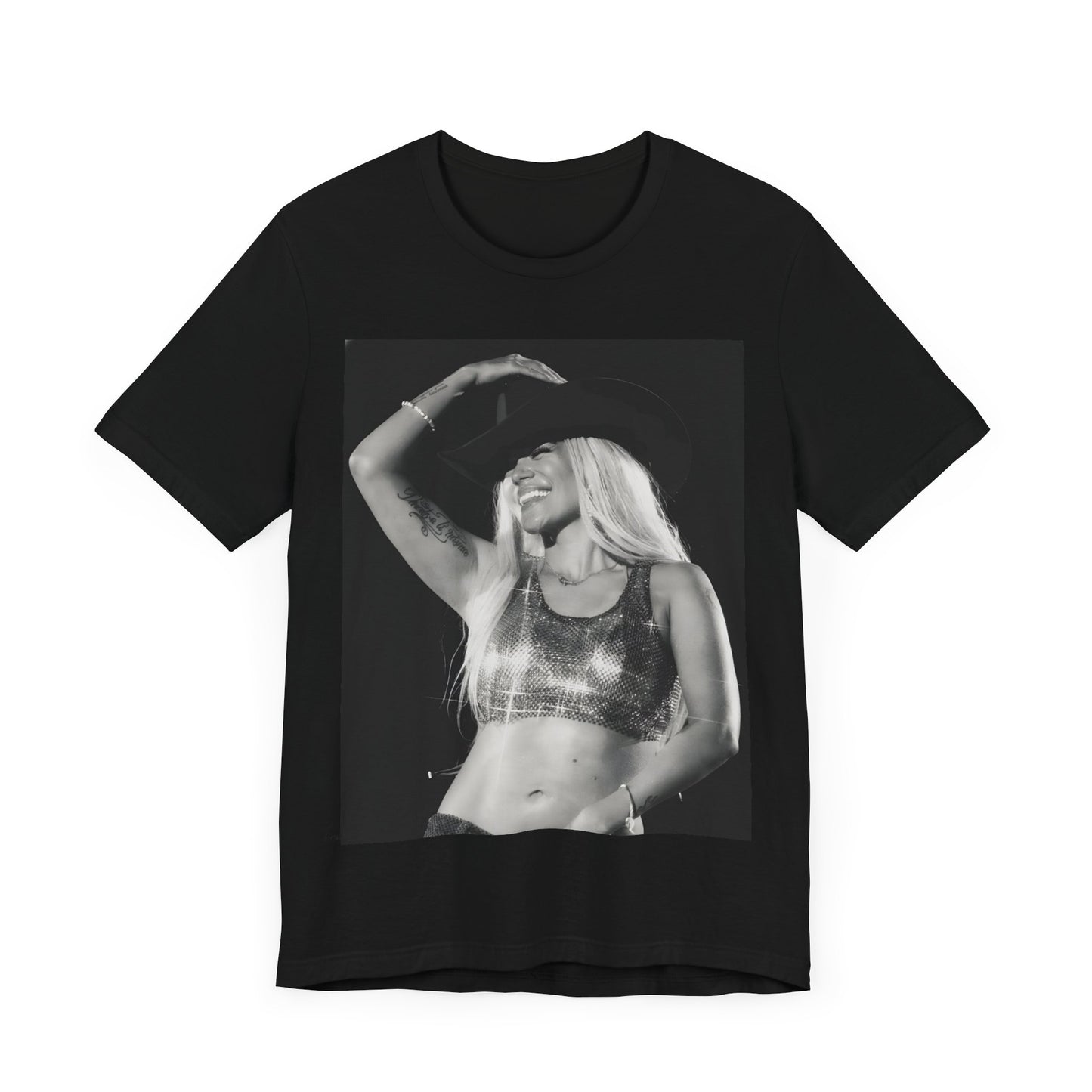 A black graphic t-shirt featuring a black and white graphic or photo of Karol G performing live on stage.