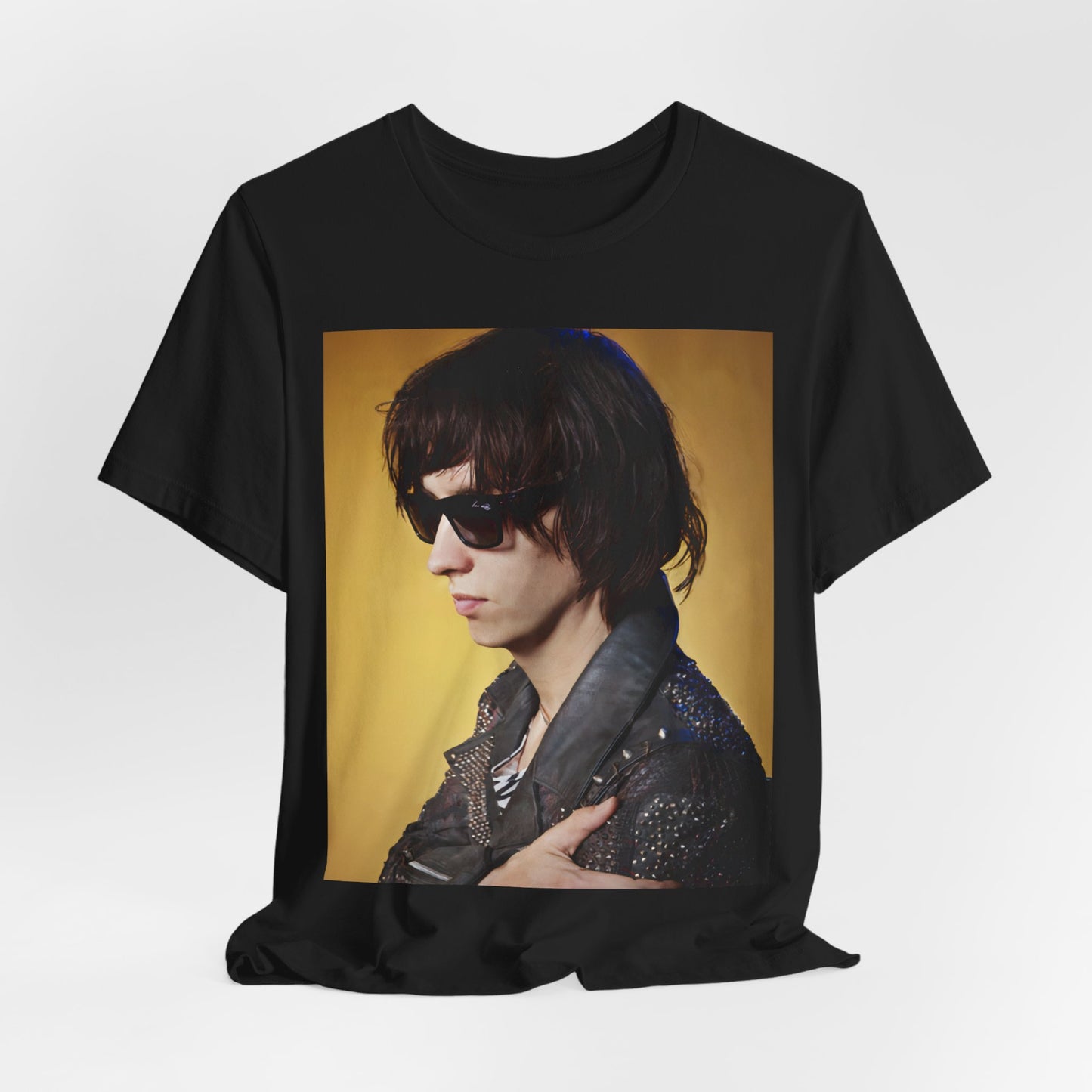 A black graphic t-shirt featuring a retro graphic related to The Strokes' 'Is This It' album era.
