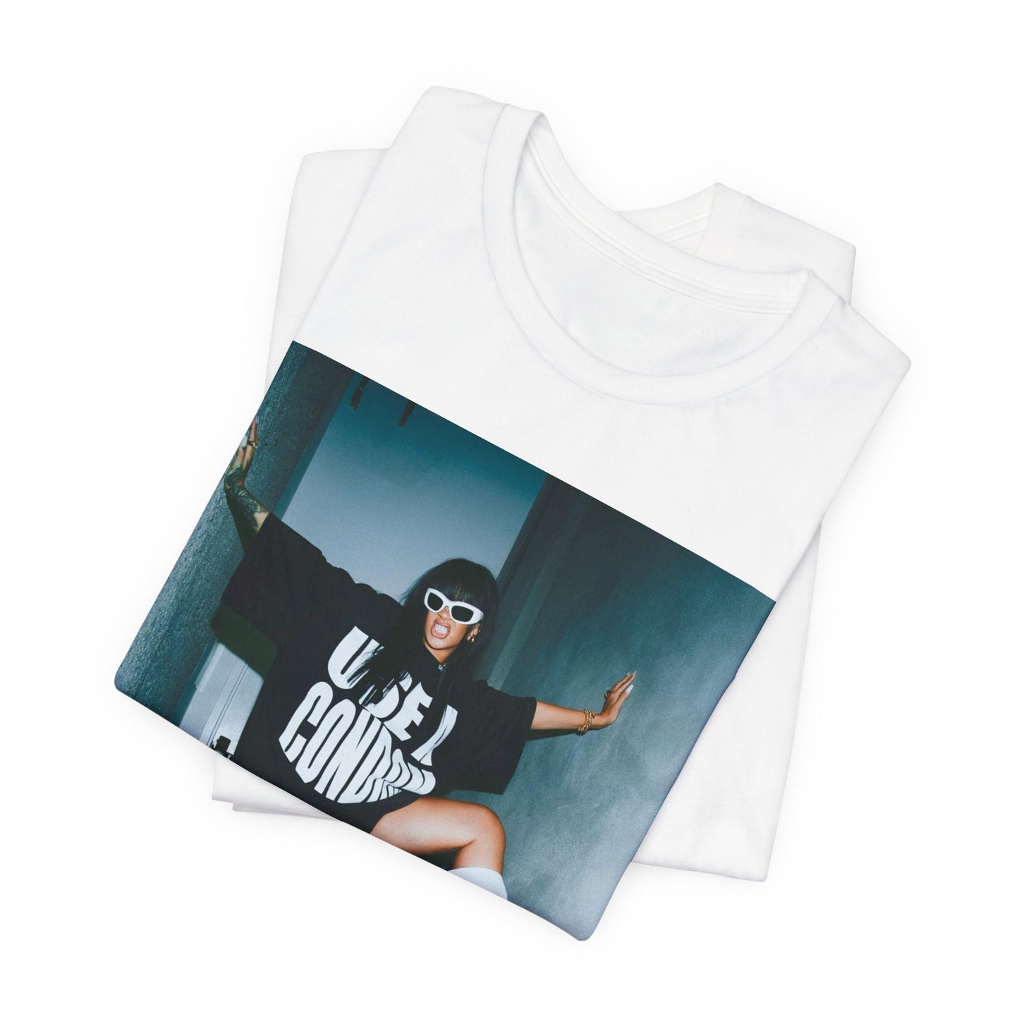 A black graphic t-shirt featuring a modern pop essential graphic of Rihanna.