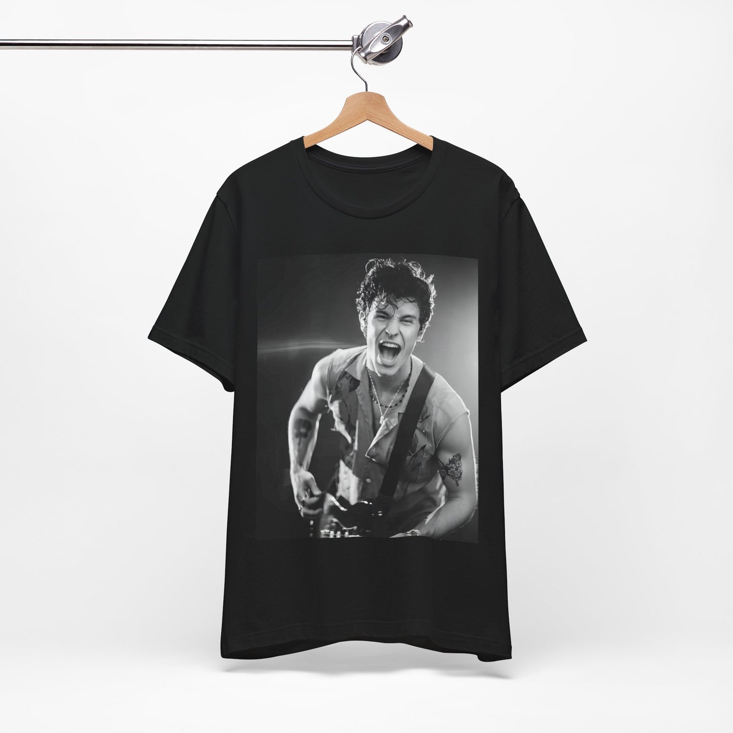 A black graphic t-shirt featuring a black and white photo of Shawn Mendes, emphasizing his charm.