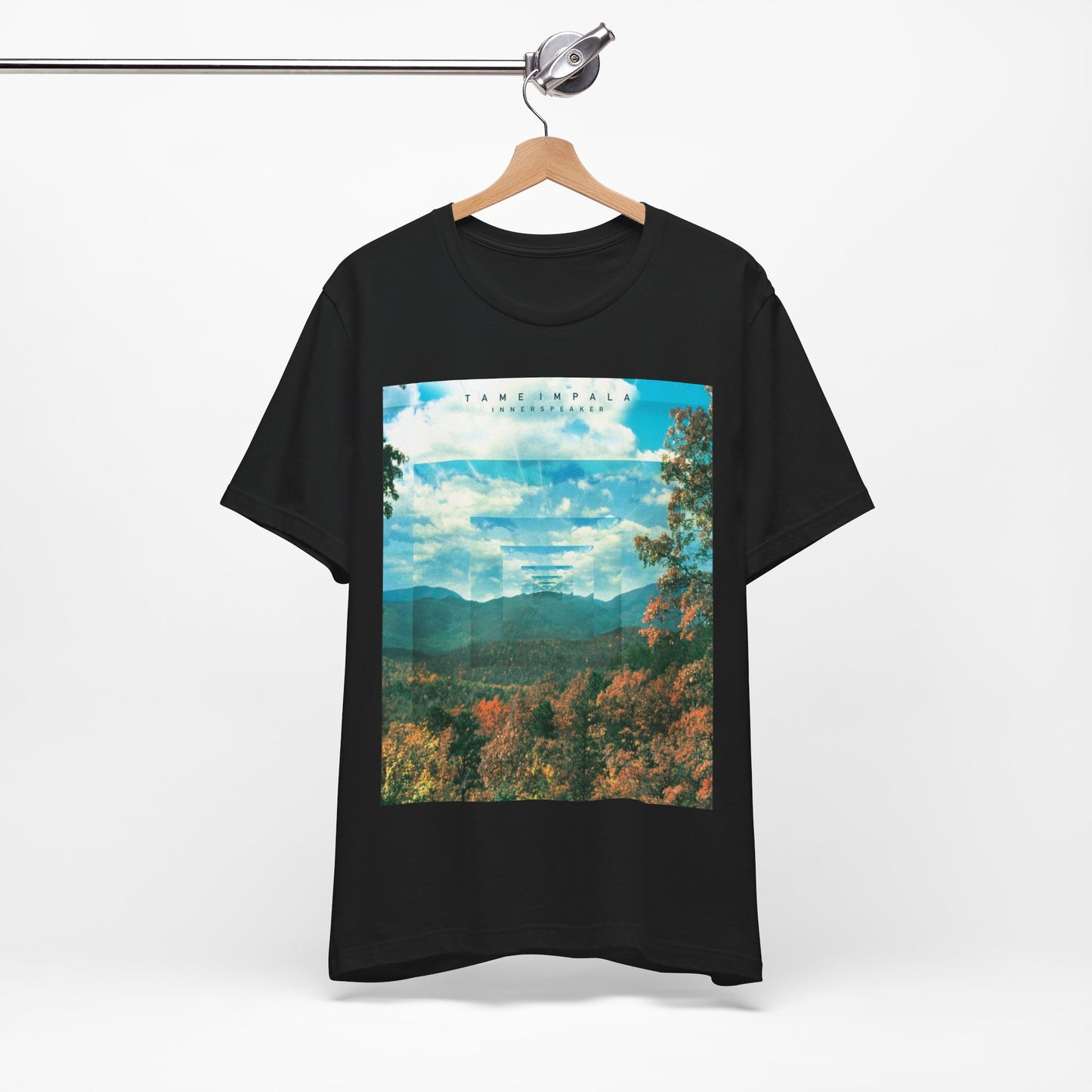 A black graphic t-shirt featuring a graphic related to Tame Impala's 'InnerSpeaker' album.