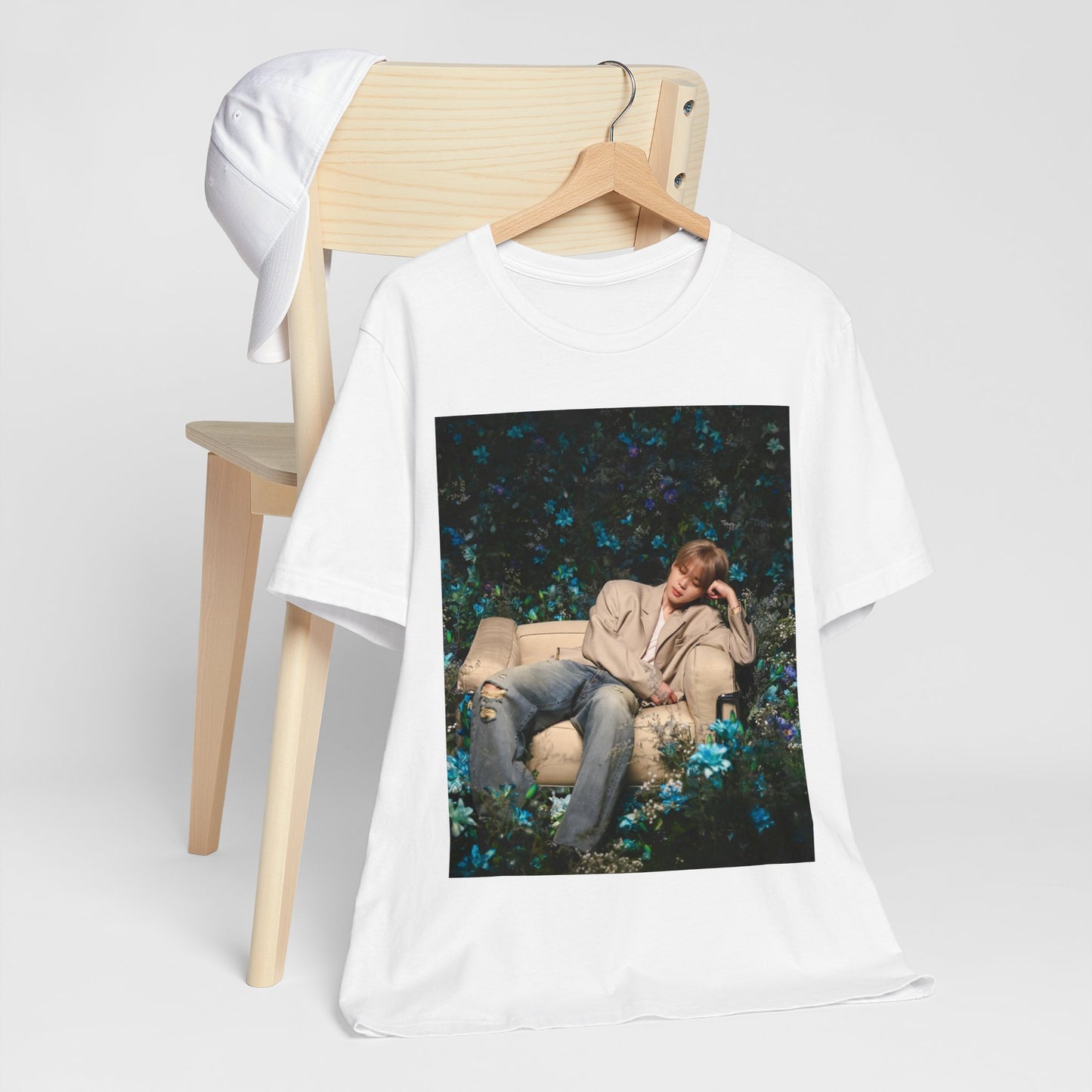 A black graphic t-shirt featuring an aesthetic graphic of Jimin in a K-Pop style.