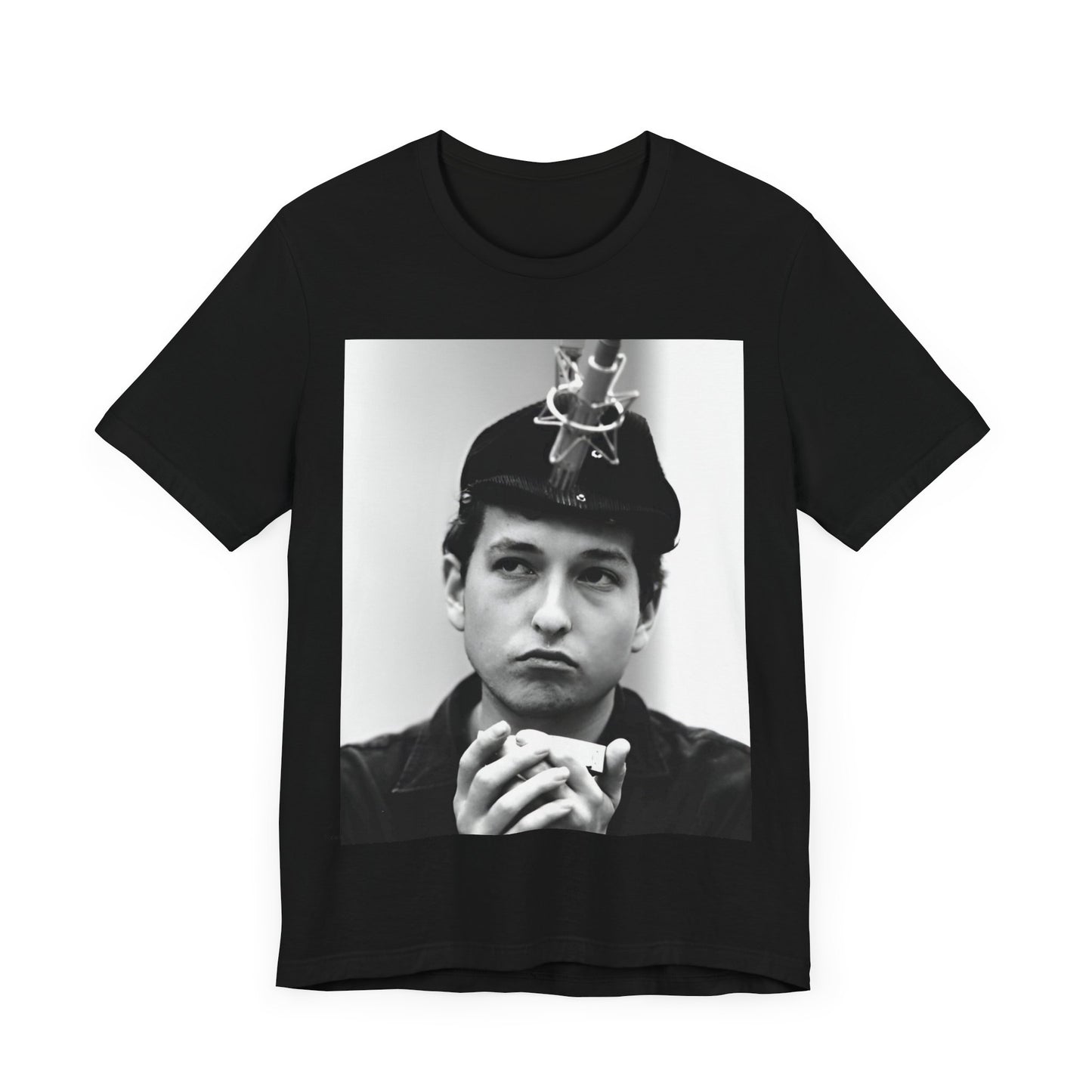 A black graphic t-shirt featuring a graphic of Bob Dylan in an acoustic session setting, possibly with his guitar.