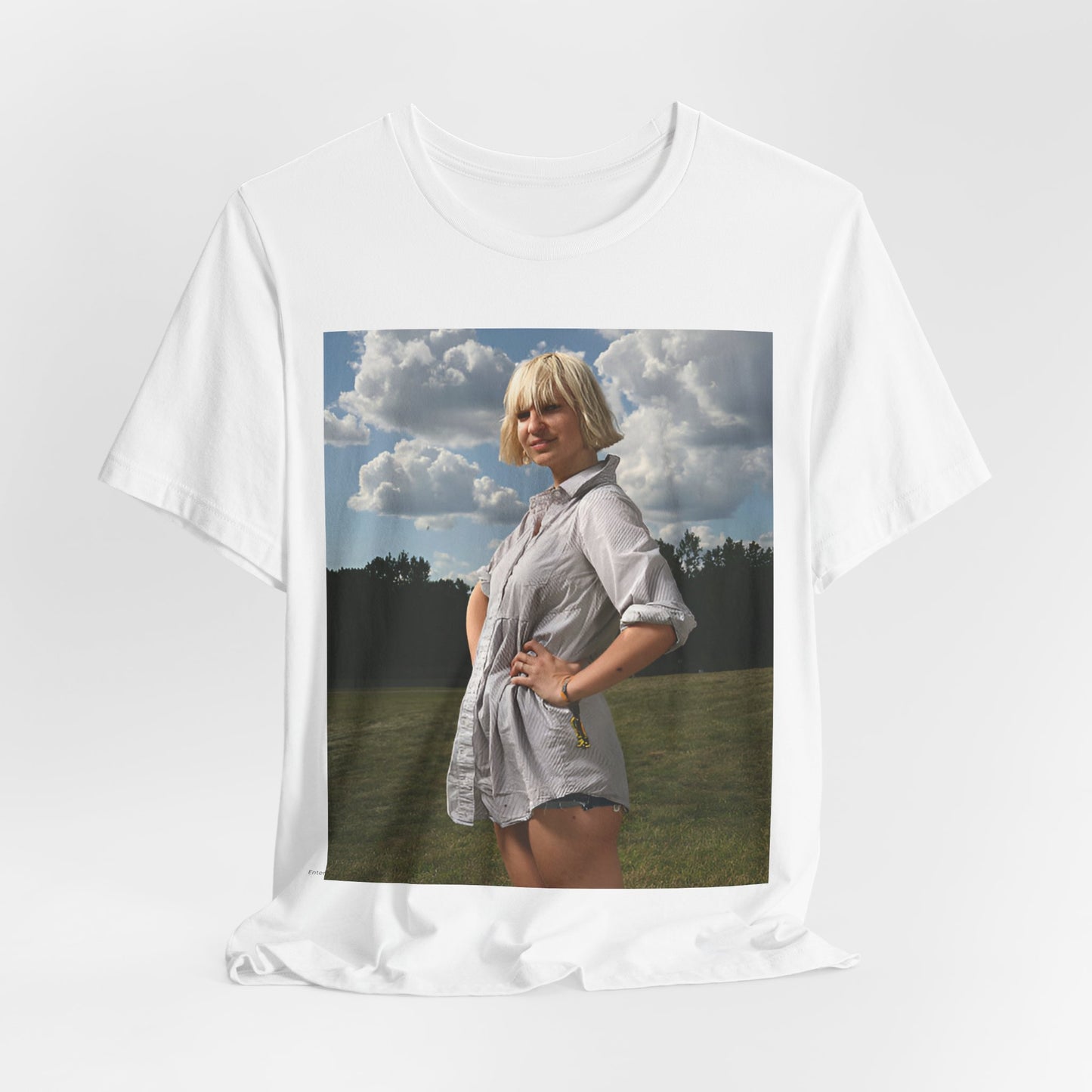 A black graphic t-shirt featuring a bold graphic of Sia as a pop superstar.