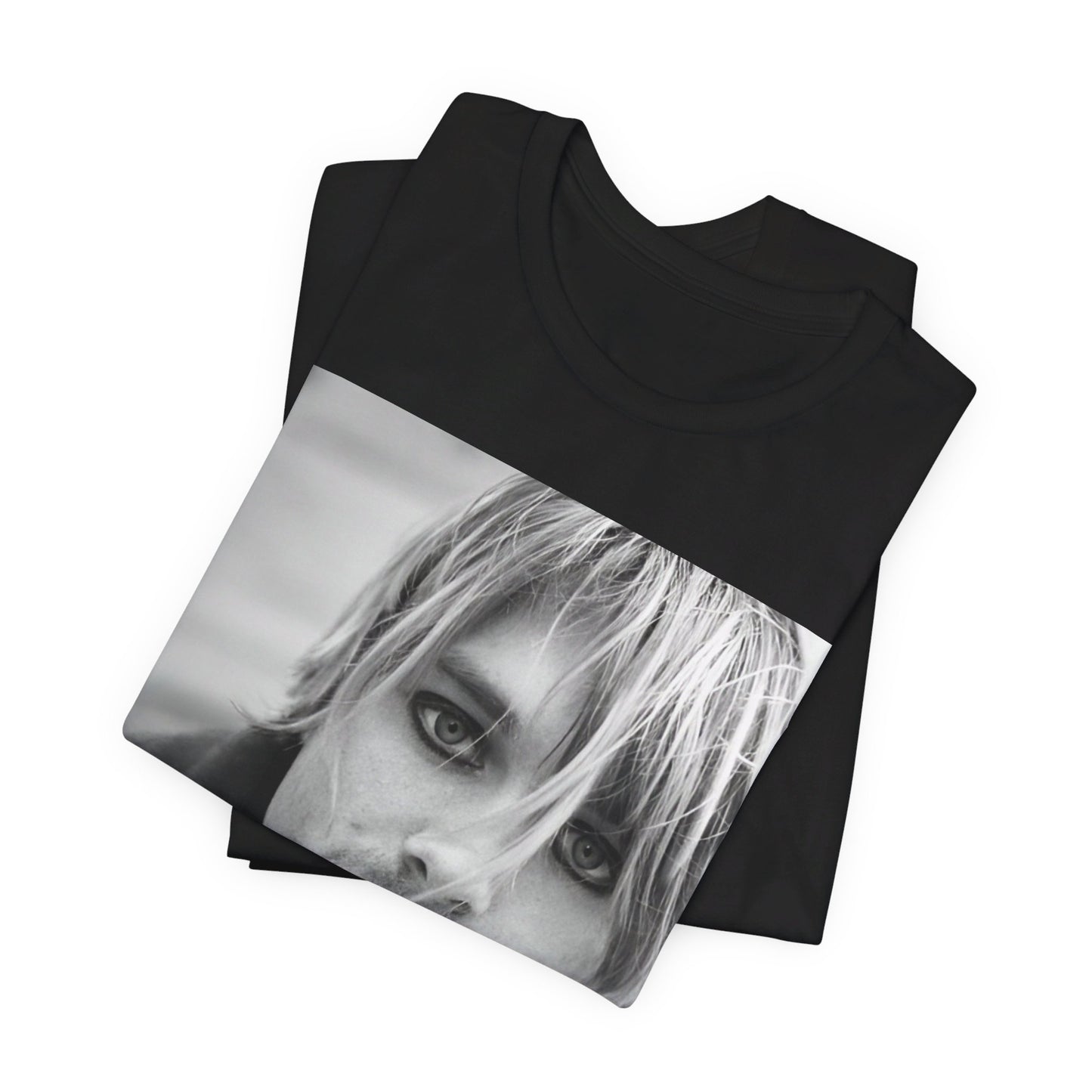 A black graphic t-shirt featuring a classic 90s alt rock graphic of Nirvana.