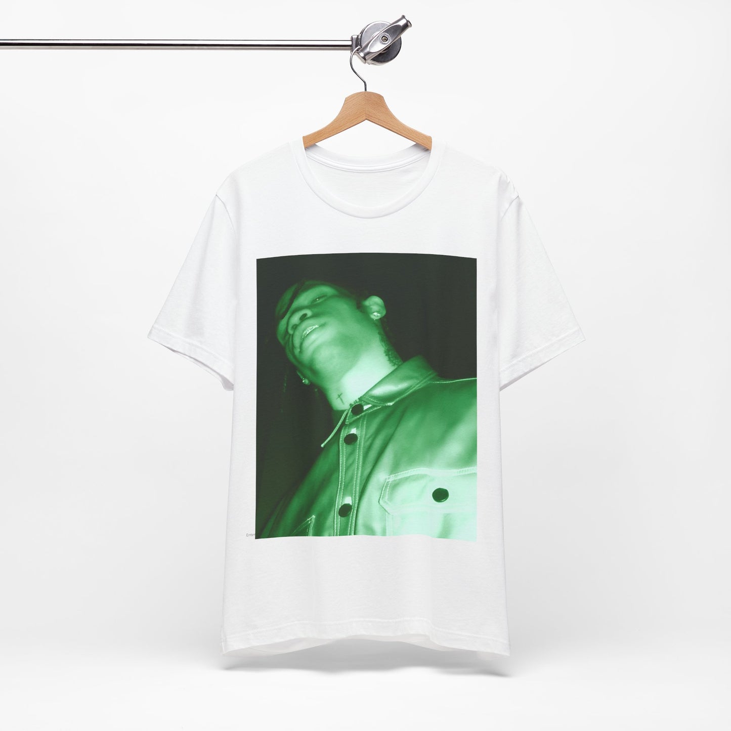 A black graphic t-shirt featuring a graphic of Travis Scott with psychedelic trap vibes.