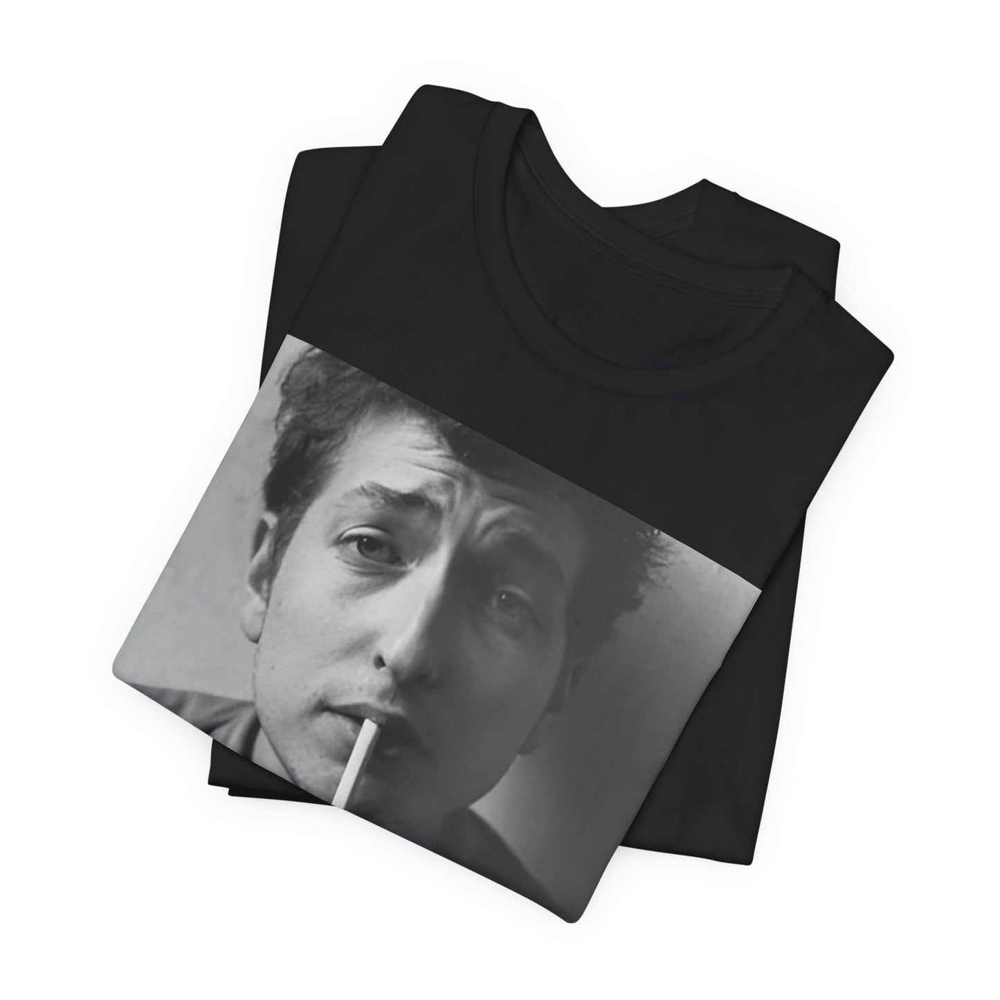 A black graphic t-shirt featuring a graphic of Bob Dylan from the 60s, depicted as a renegade folk icon.