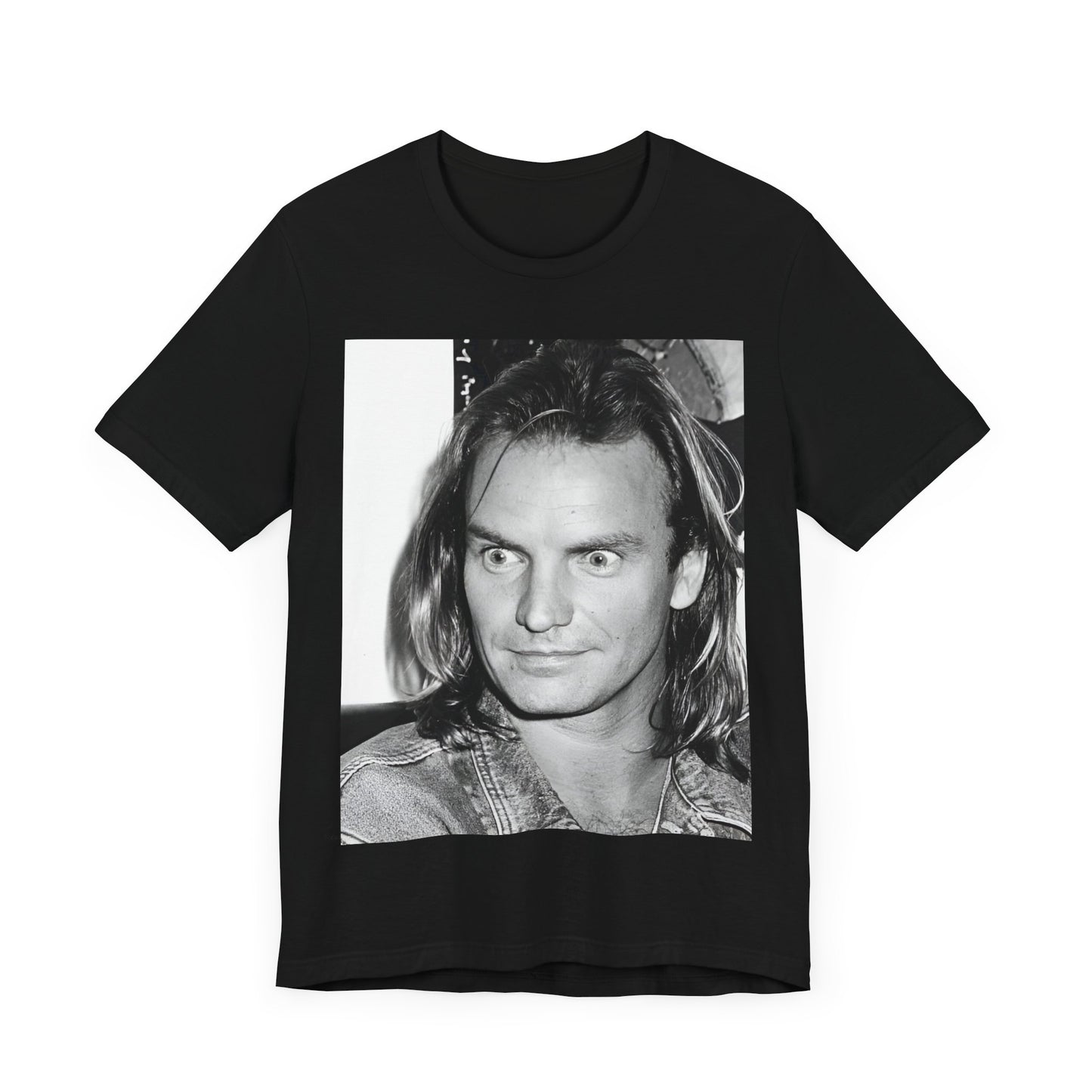 A black graphic t-shirt featuring a retro graphic related to Sting's 'Synchronicity' album era.