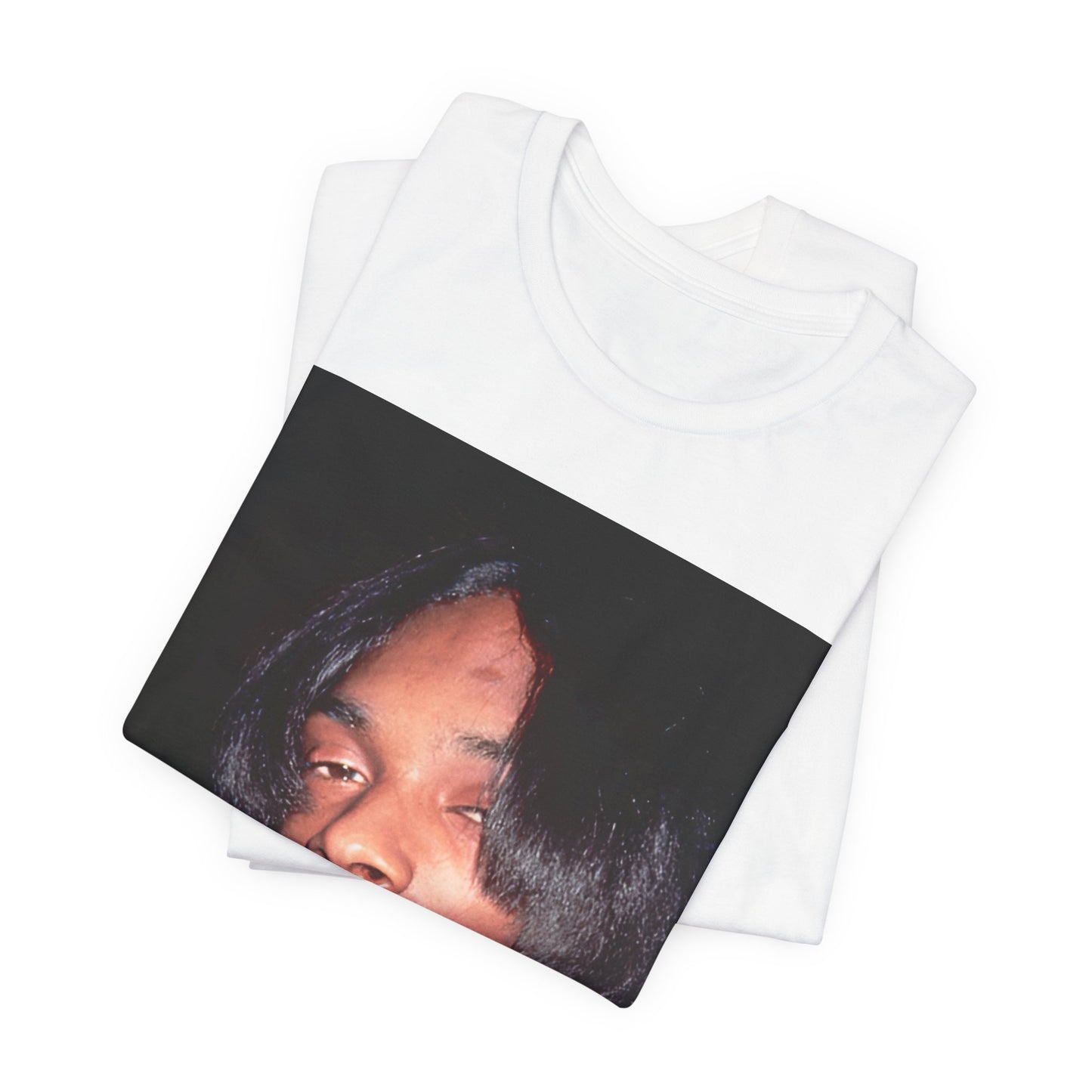 A black graphic t-shirt featuring a 90s black and white graphic of Snoop Dogg as a global icon in rap.