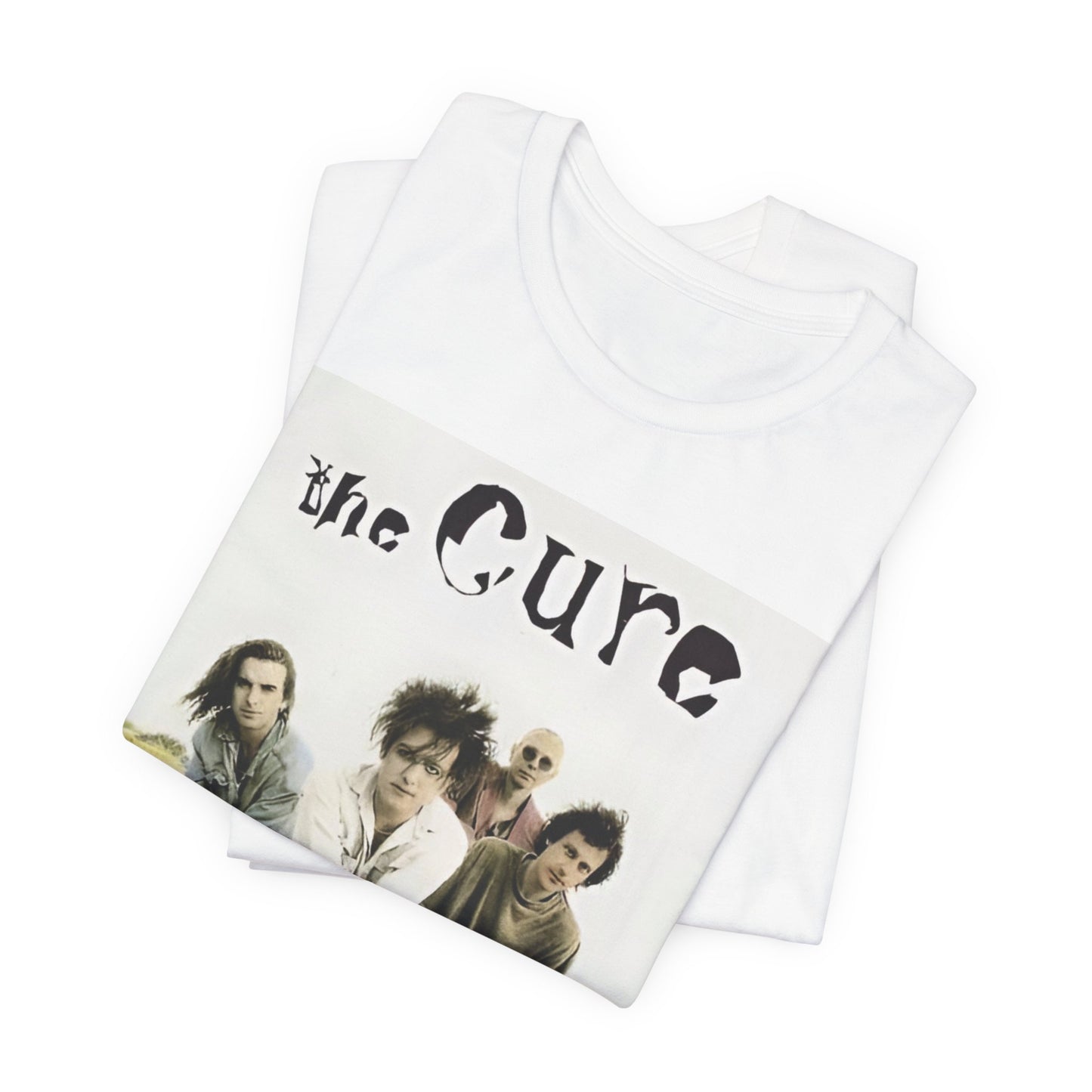 A black graphic t-shirt featuring a graphic of The Cure as post-punk pioneers.