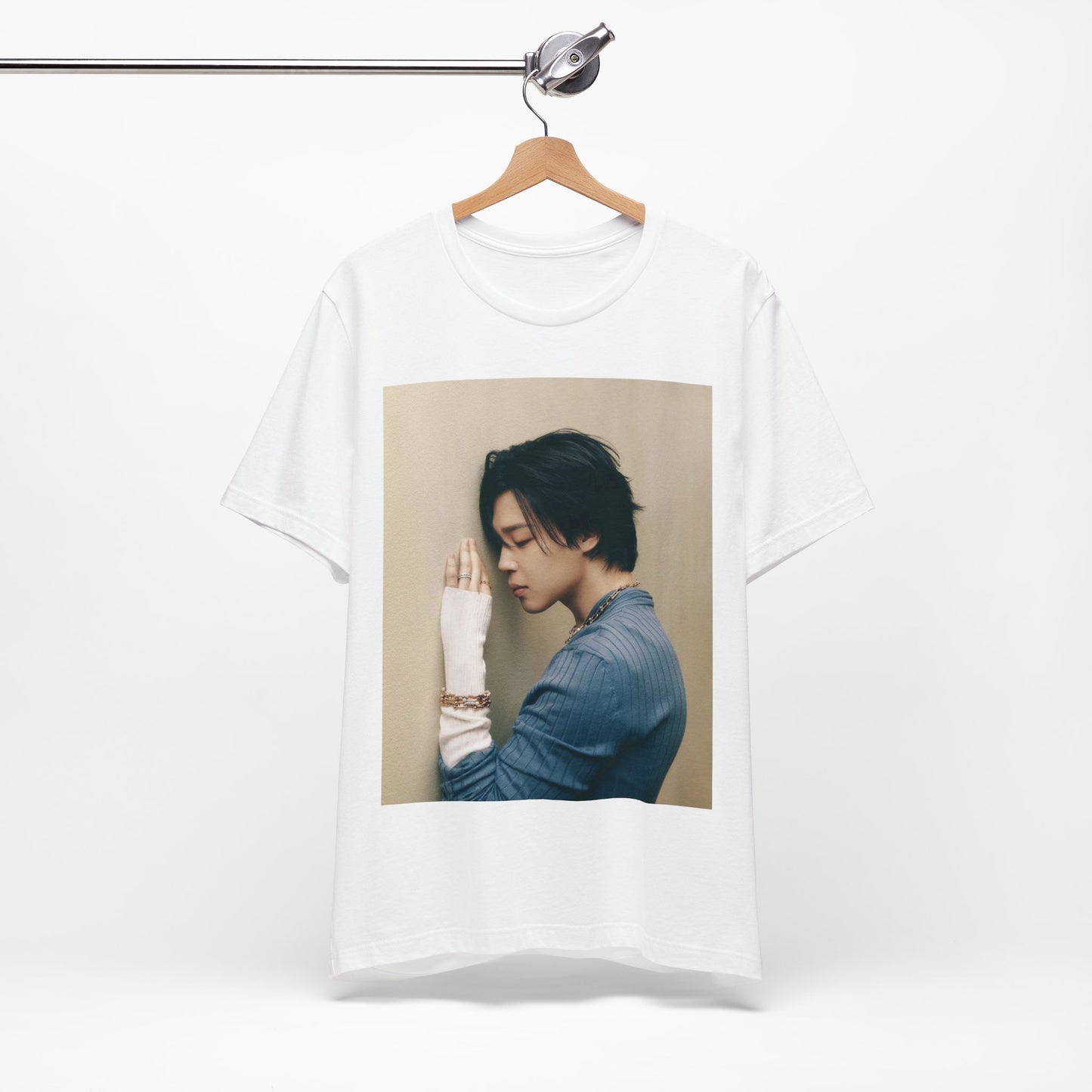 A black graphic t-shirt featuring a cool K-Pop idol essential graphic of Jimin.