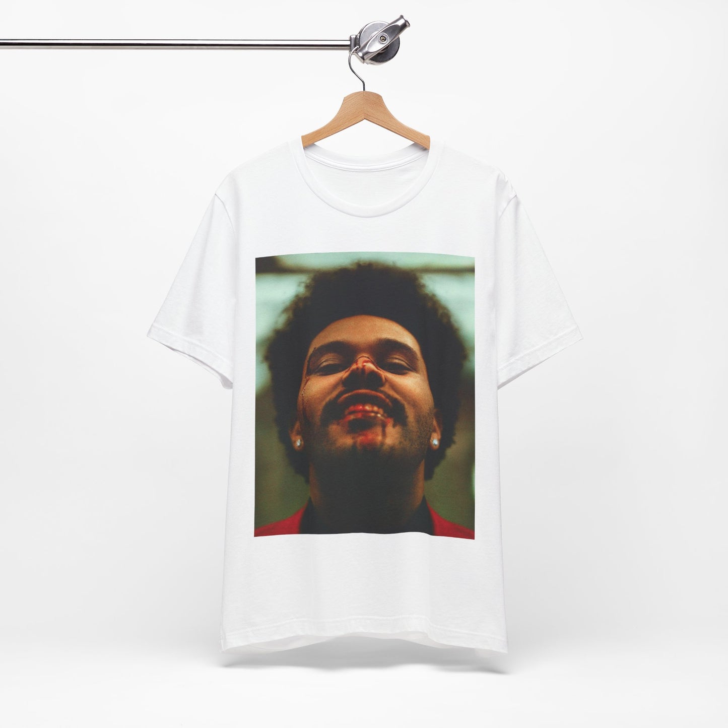 A black graphic t-shirt featuring the album cover art for The Weeknd's 'After Hours'.