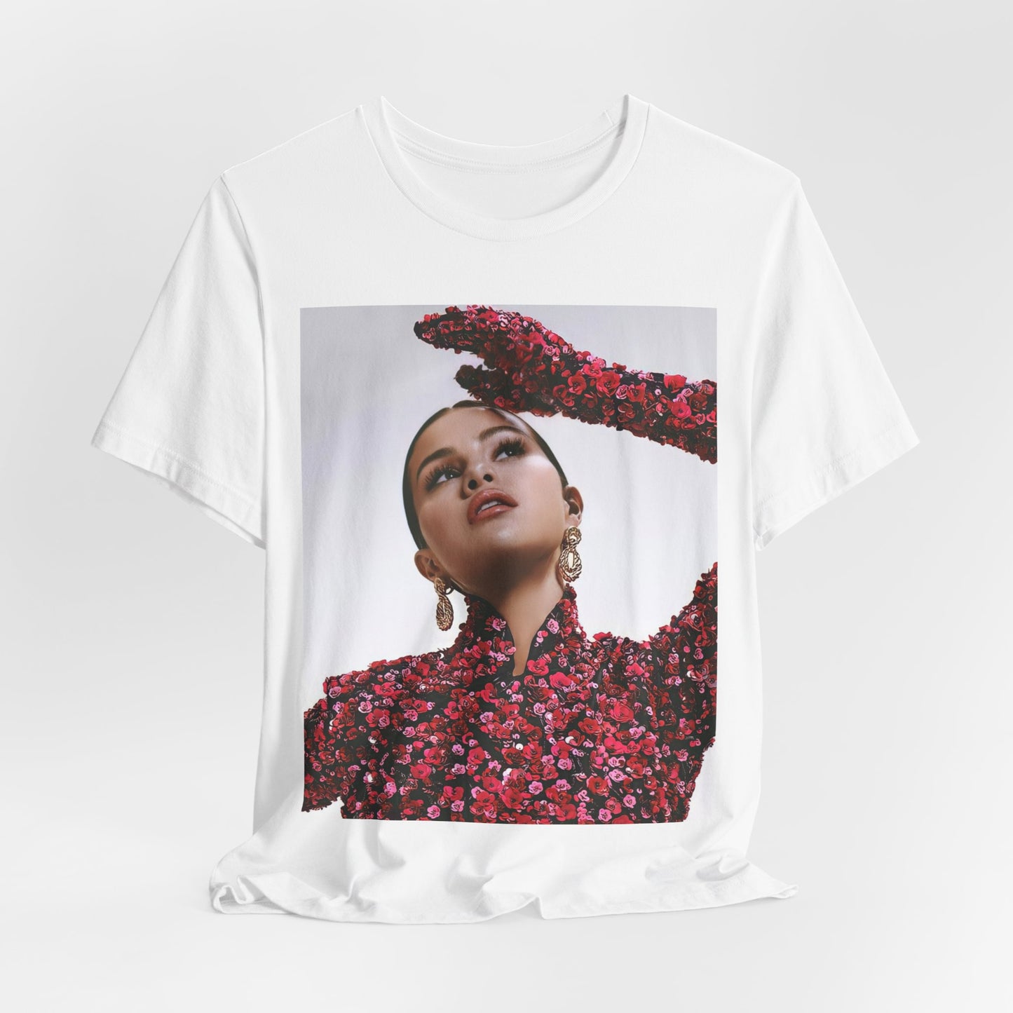 A black graphic t-shirt featuring a classic aesthetic graphic of Selena Gomez.