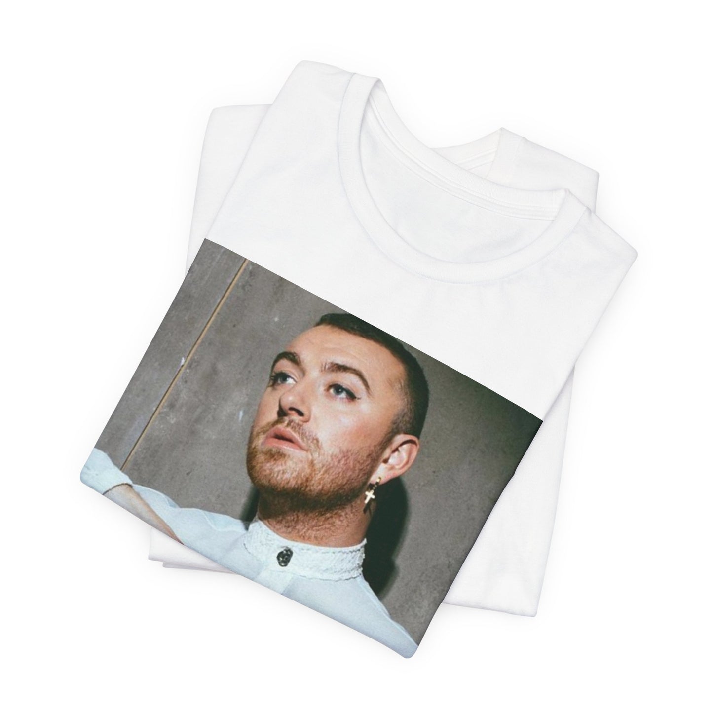 A black graphic t-shirt featuring a vintage graphic of Sam Smith emphasizing their soulful voice.