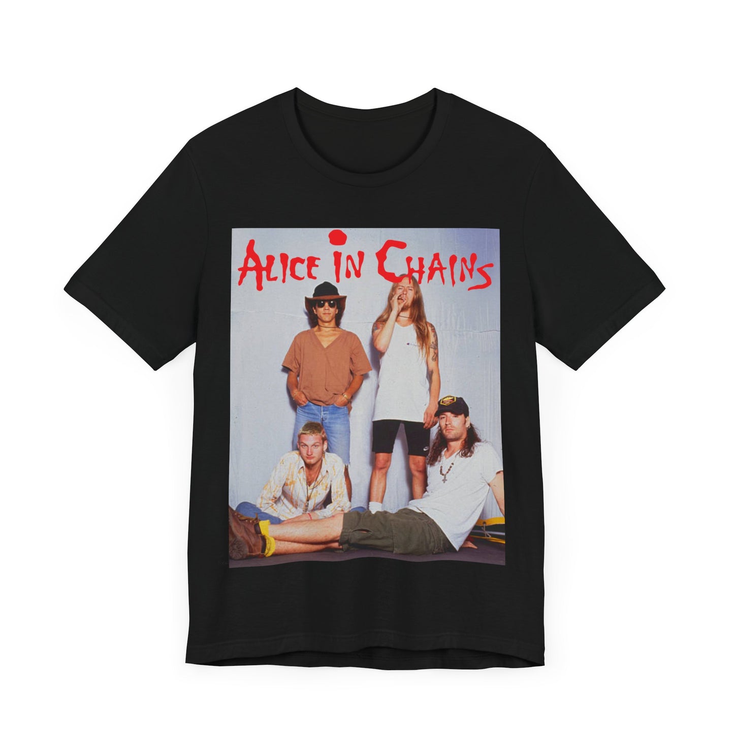 A black graphic t-shirt featuring a band graphic of Alice In Chains from 1990, capturing their early grunge aesthetic.