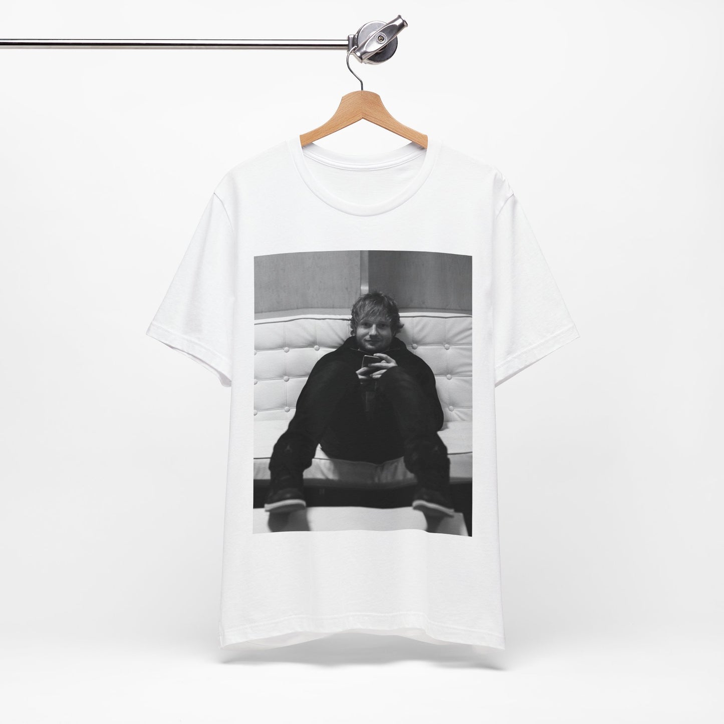 A black graphic t-shirt featuring a bold black and white graphic of Ed Sheeran.