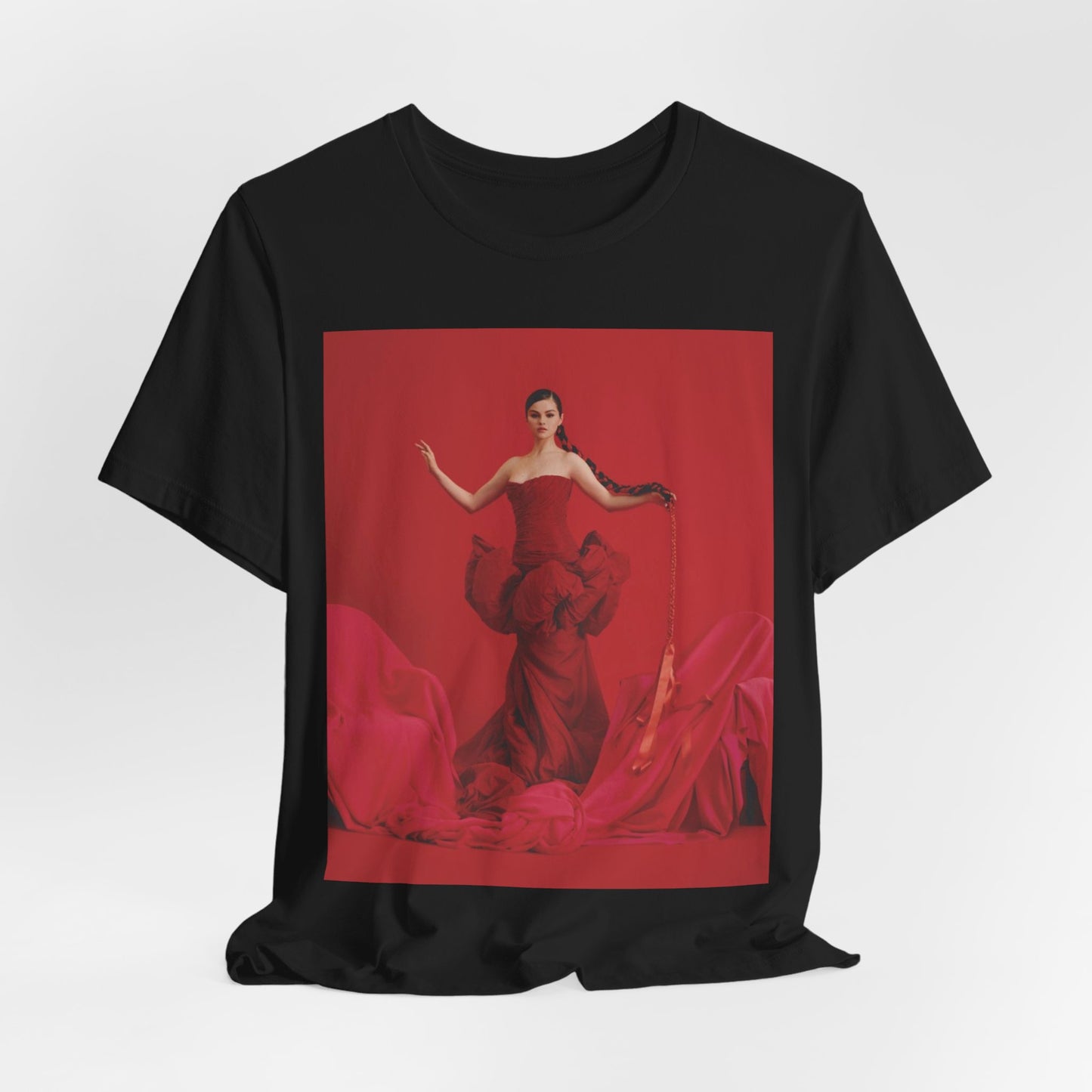 A black graphic t-shirt featuring a glam pop diva graphic of Selena Gomez.