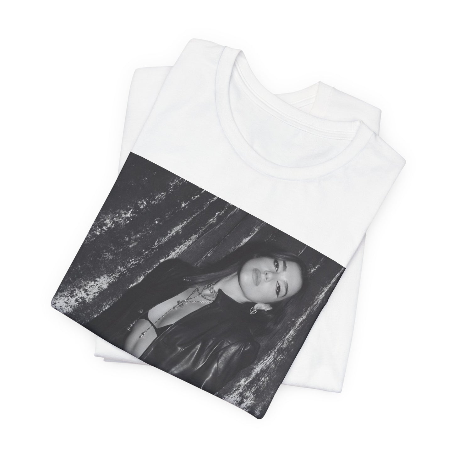 A black graphic t-shirt featuring a black and white portrait photo of Dua Lipa.