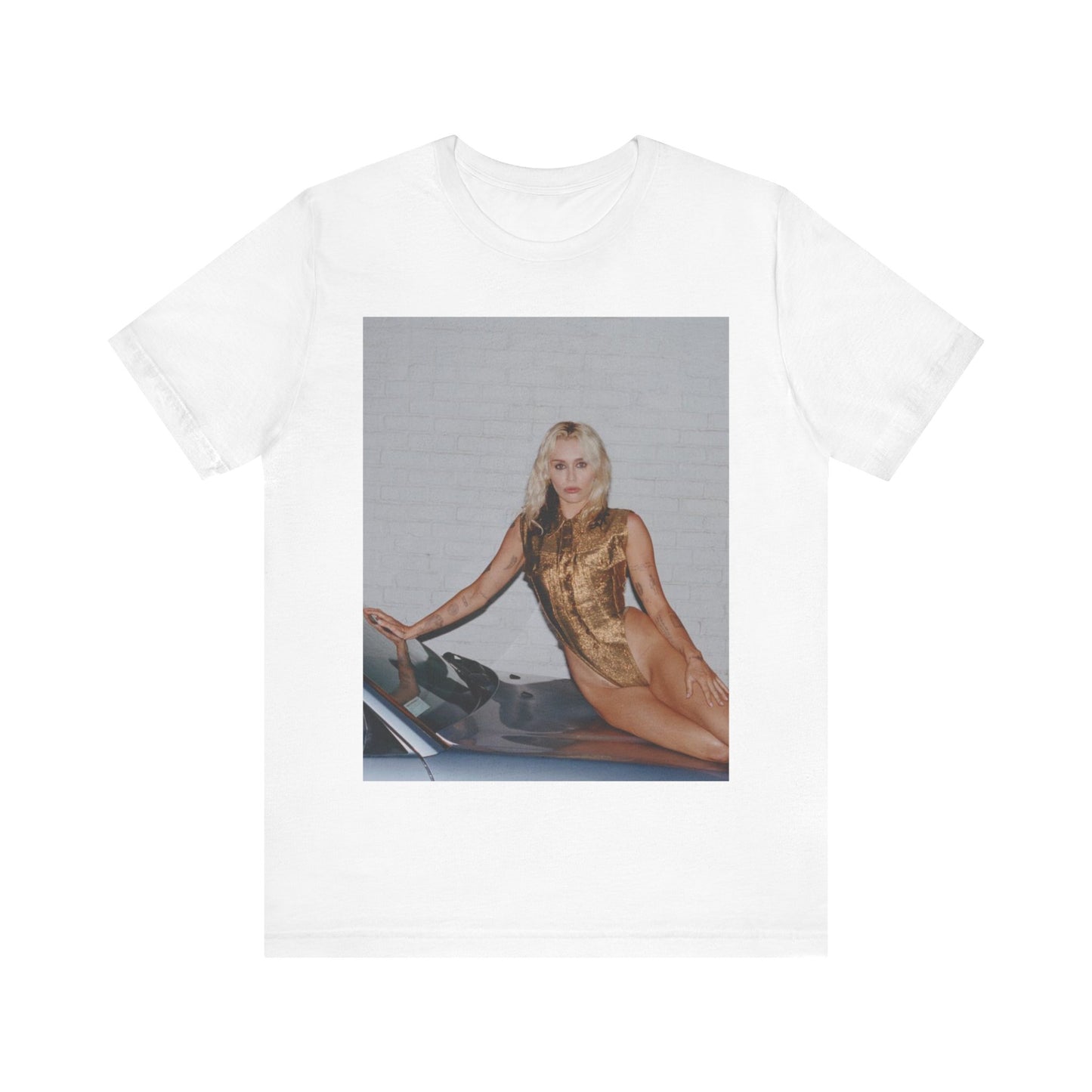 A black graphic t-shirt featuring an iconic fashion graphic of Miley Cyrus.
