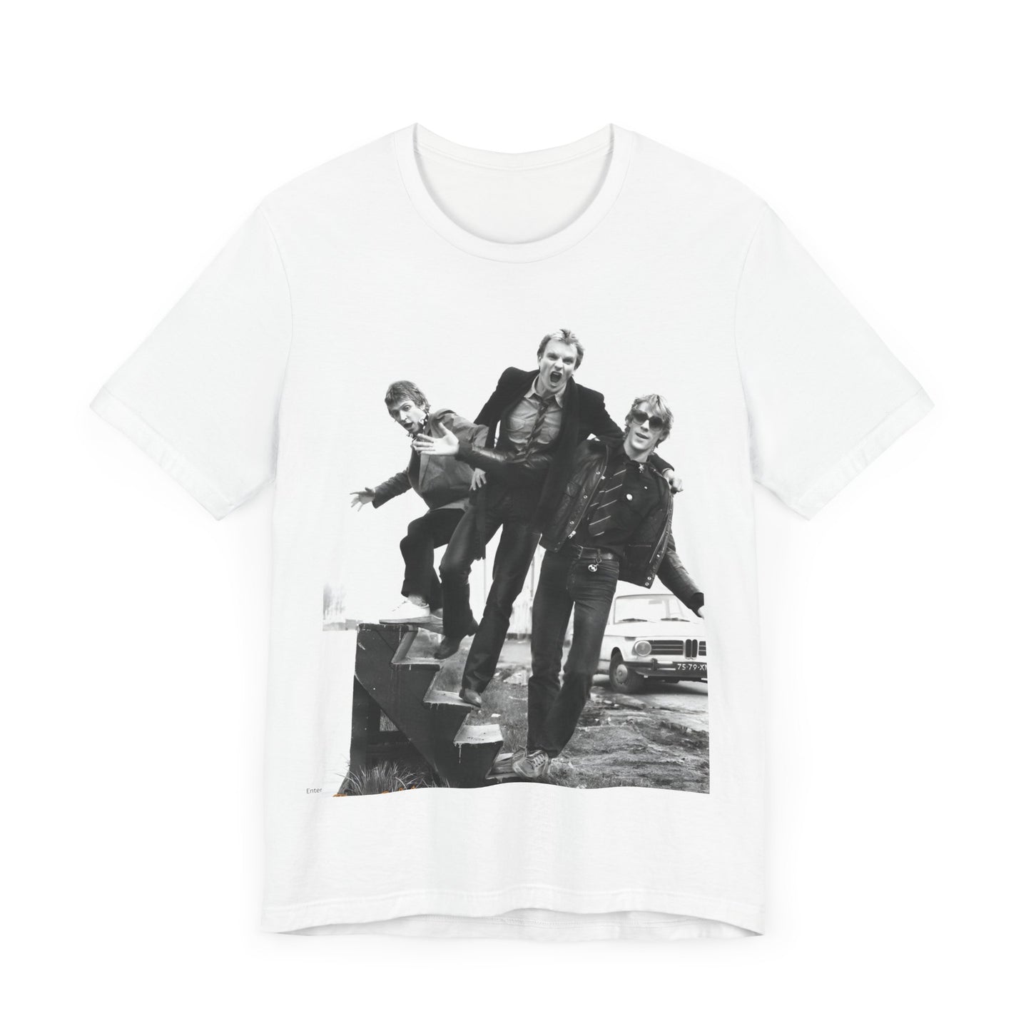 A black graphic t-shirt featuring an early days reggae rock graphic of The Police.
