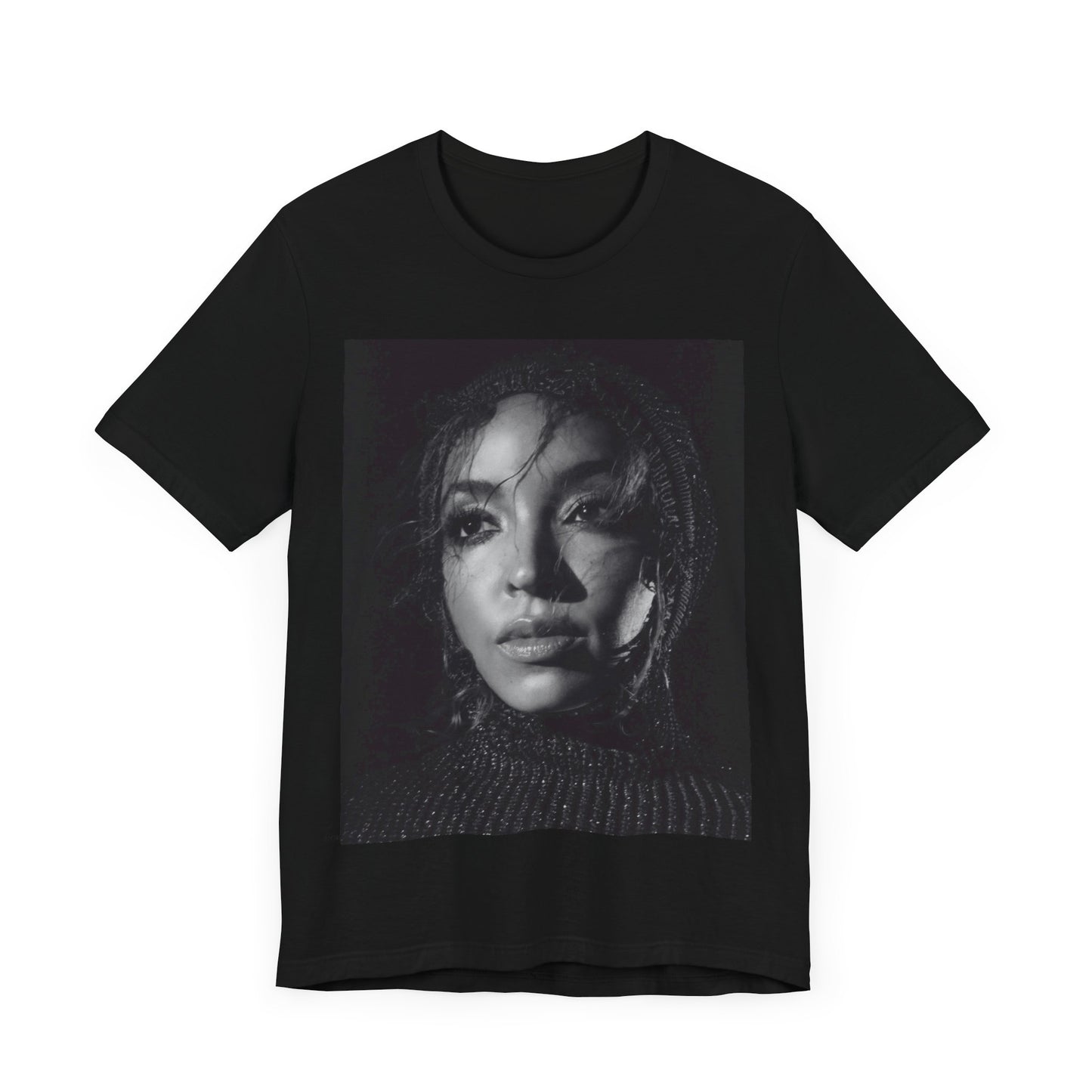 A black graphic t-shirt featuring a black and white portrait photo of Tinashe.