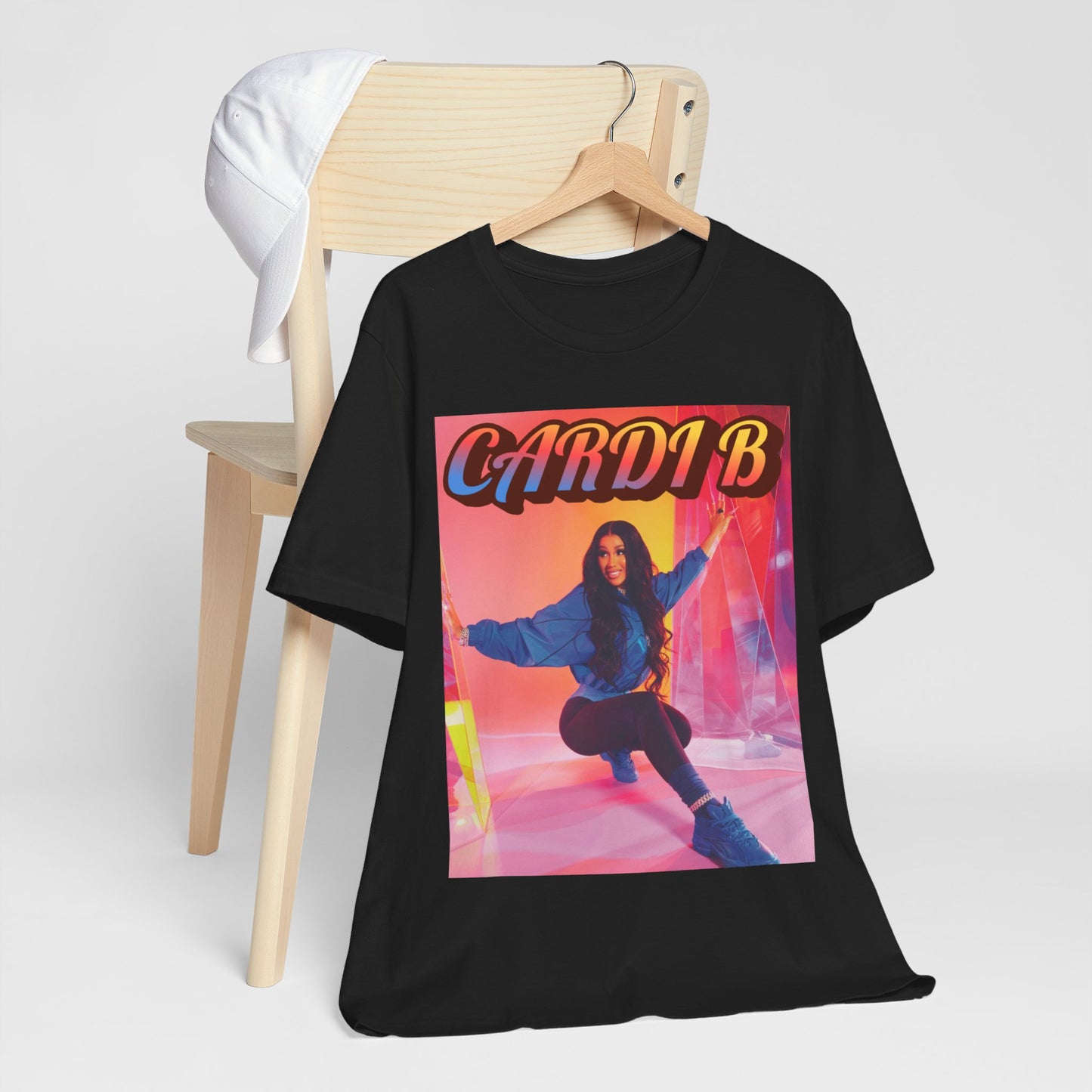 A black graphic t-shirt featuring a graphic of Cardi B, designed with a rap aesthetic.