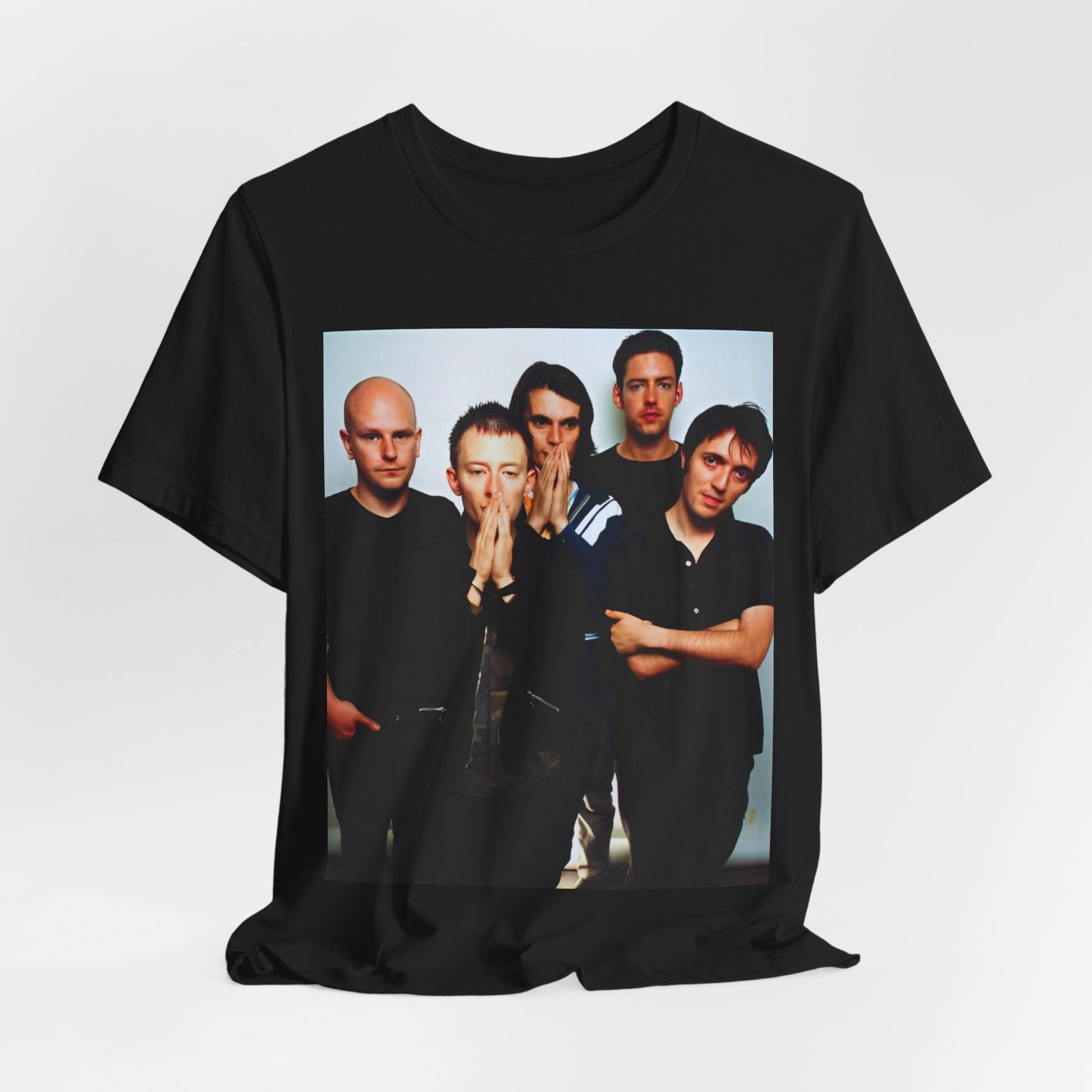 A black graphic t-shirt featuring a bold alt rock superstar graphic of Radiohead.