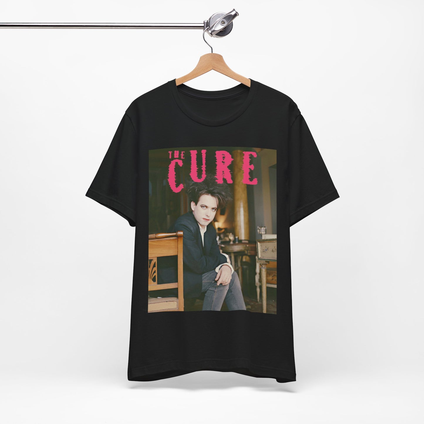 A black graphic t-shirt featuring a retro graphic related to The Cure's 'Disintegration' album era.