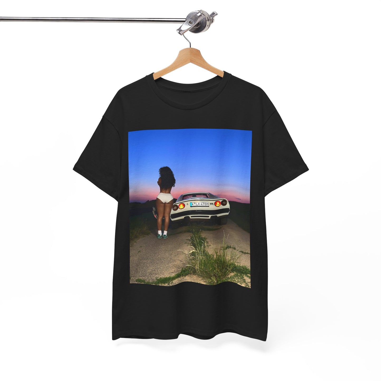 A black graphic t-shirt featuring a vintage alt R&B graphic of SZA.