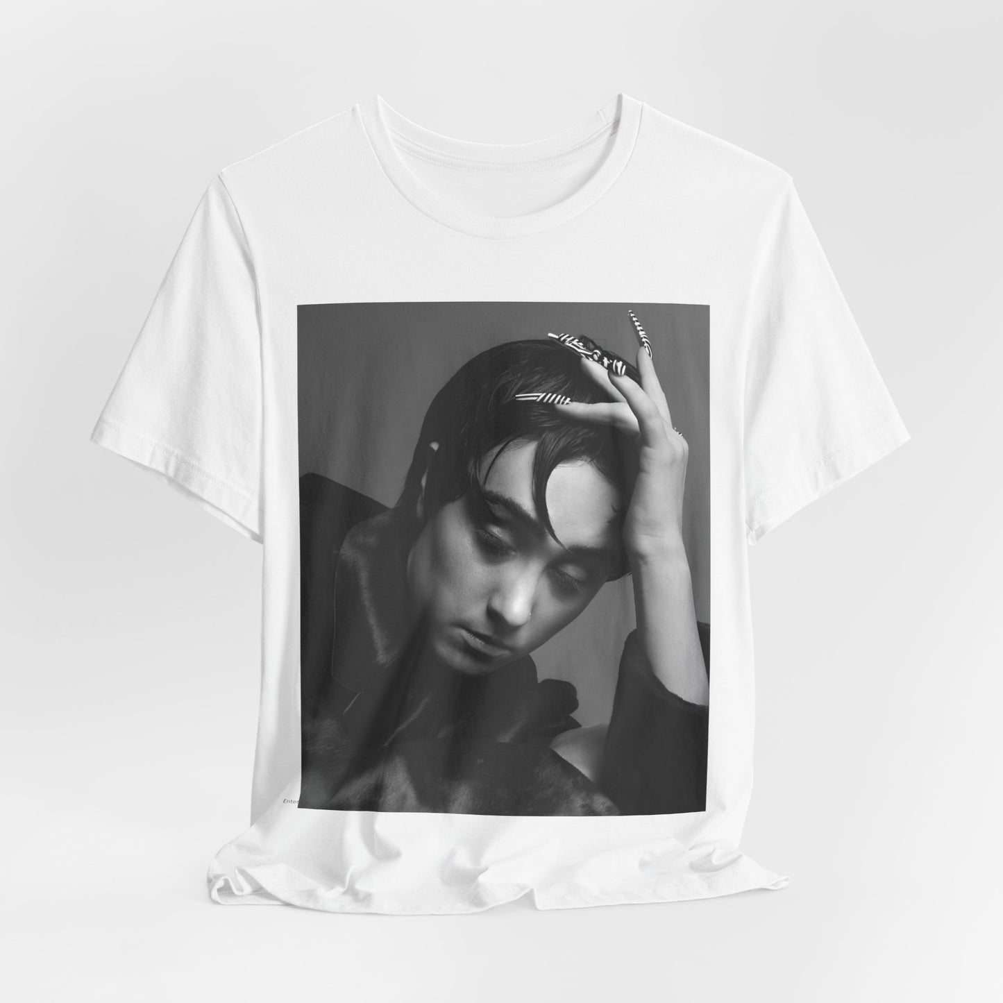 A black graphic t-shirt featuring a black and white graphic of Chappell Roan as a queer pop icon.