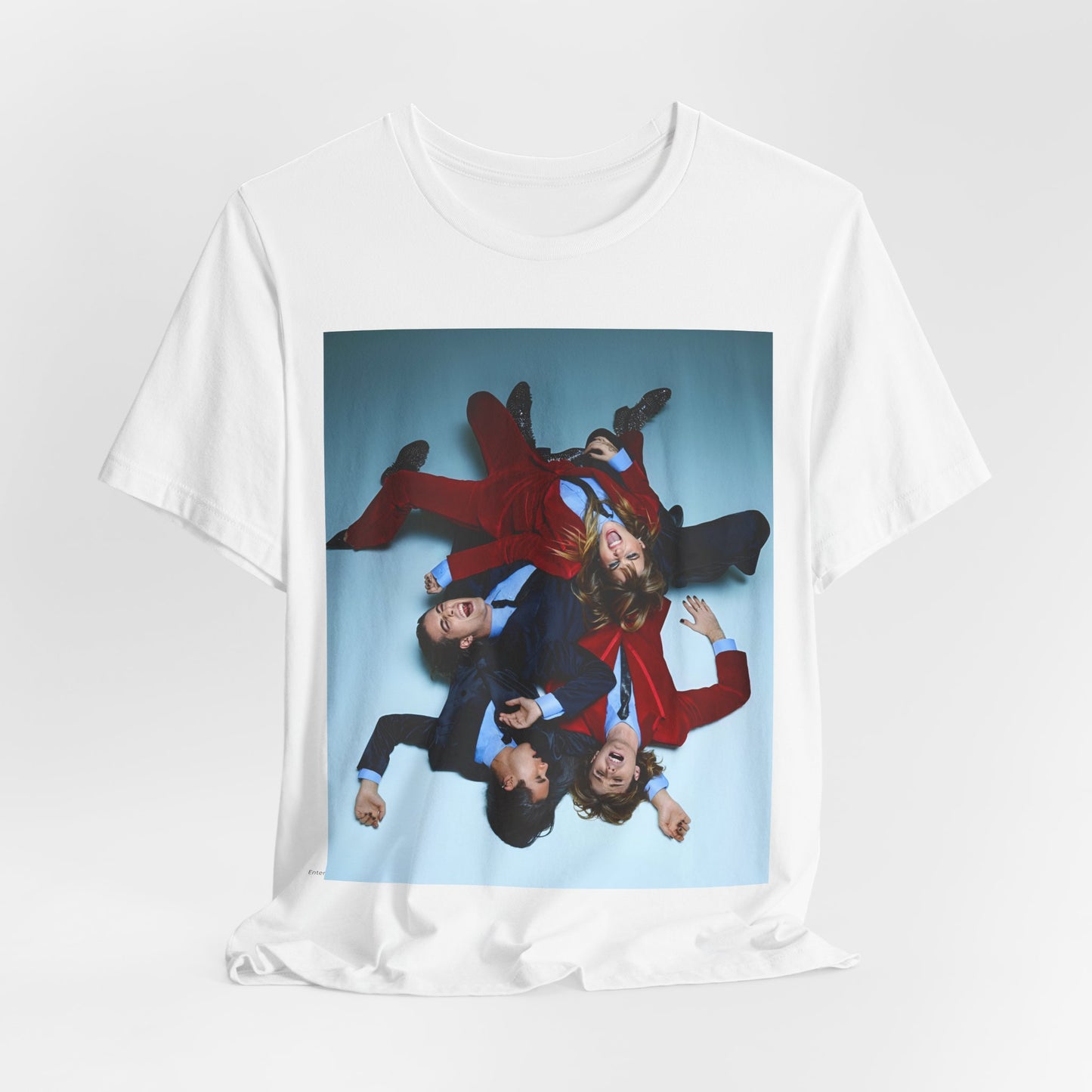 A black graphic t-shirt featuring a graphic of Maneskin in a 70s rock style aesthetic.