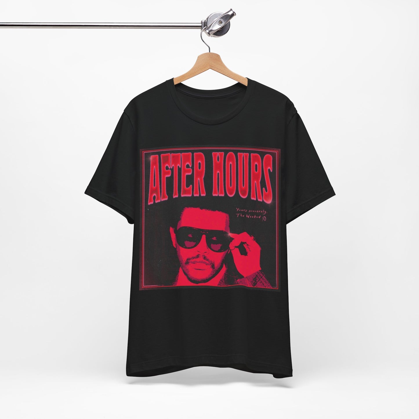 A black graphic t-shirt featuring a retro graphic related to The Weeknd's 'After Hours' album.