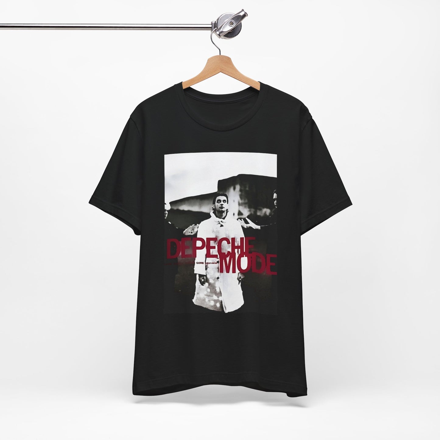 A black graphic t-shirt featuring a graphic related to Depeche Mode's 'Policy of Truth' song or era.