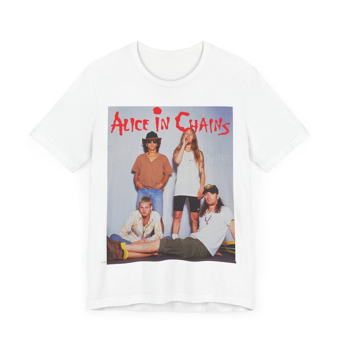 A black graphic t-shirt featuring a band graphic of Alice In Chains from 1990, capturing their early grunge aesthetic.