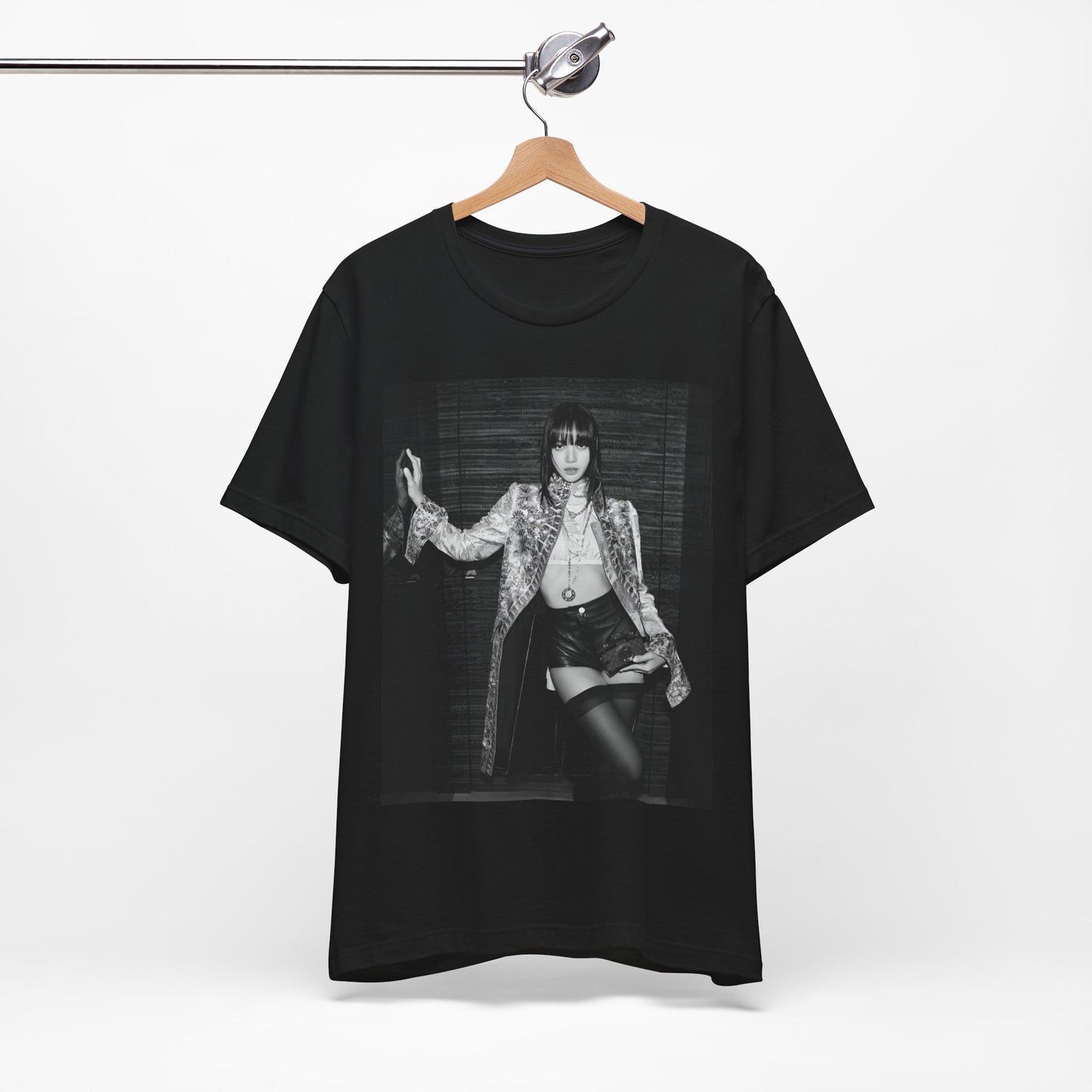 A black graphic t-shirt featuring a black and white, monochrome graphic or photo of Lisa.