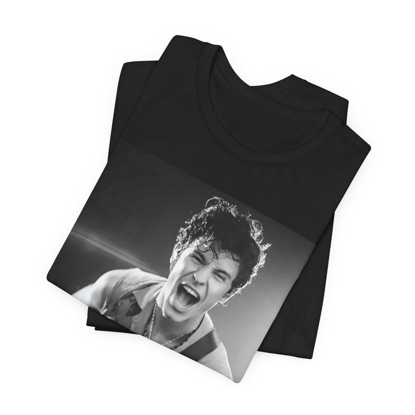 A black graphic t-shirt featuring a black and white photo of Shawn Mendes, emphasizing his charm.