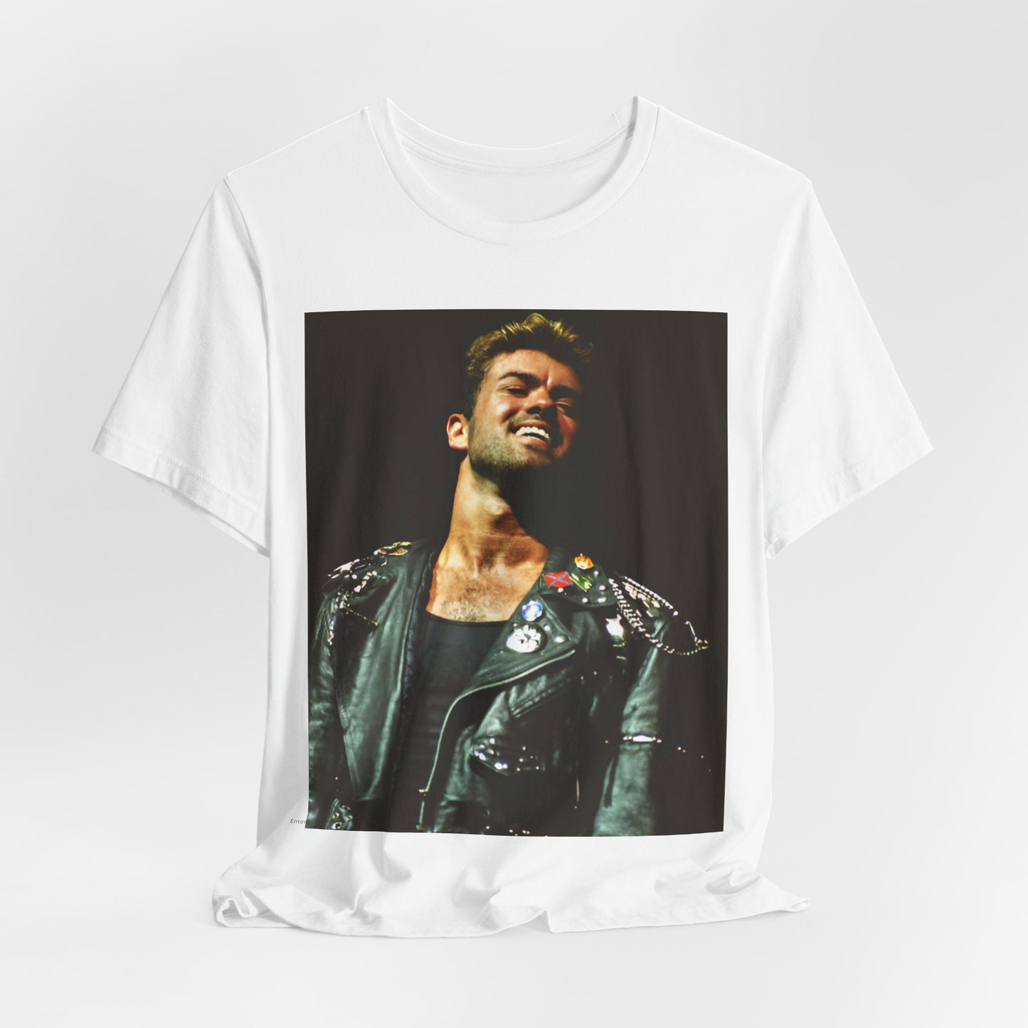 A black graphic t-shirt featuring a graphic related to George Michael's 'Careless Whisper' song or era.