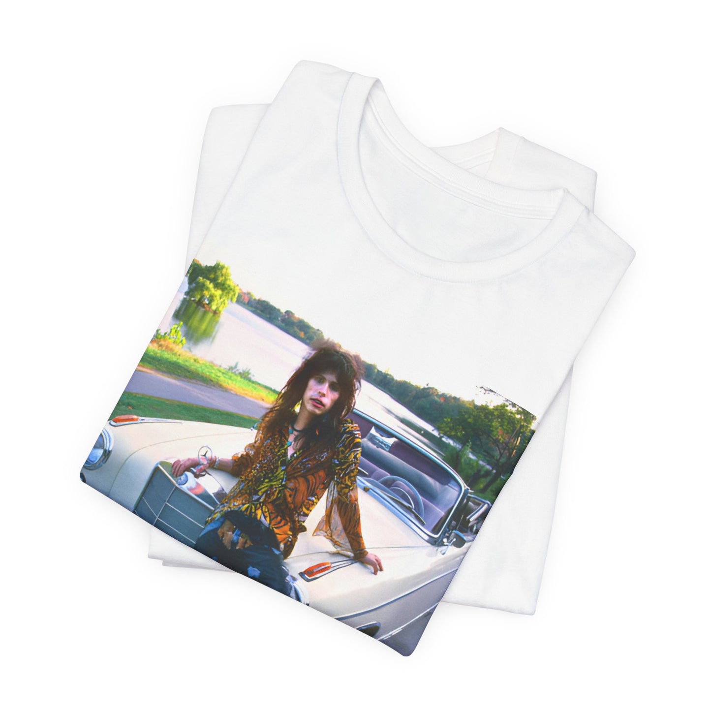 A black graphic t-shirt featuring a retro 70s photo of Aerosmith band members in a bohemian style, posing with a classic Mercedes car.