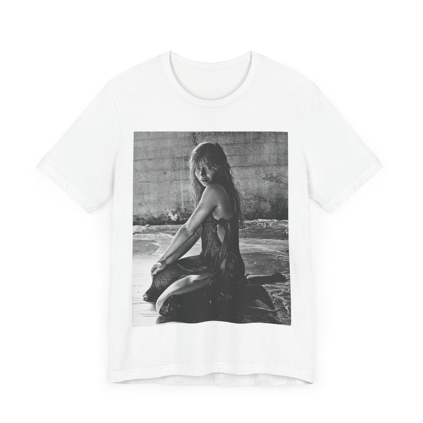 A black graphic t-shirt featuring a black and white, monochrome graphic or photo of Sabrina Carpenter.