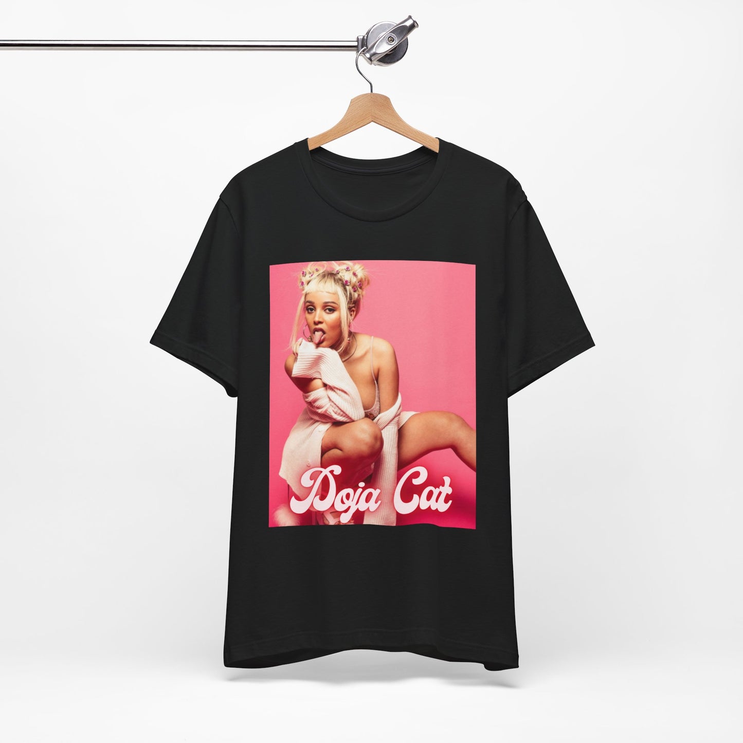 A black graphic t-shirt featuring a graphic related to Doja Cat's 'Woman' song or era.