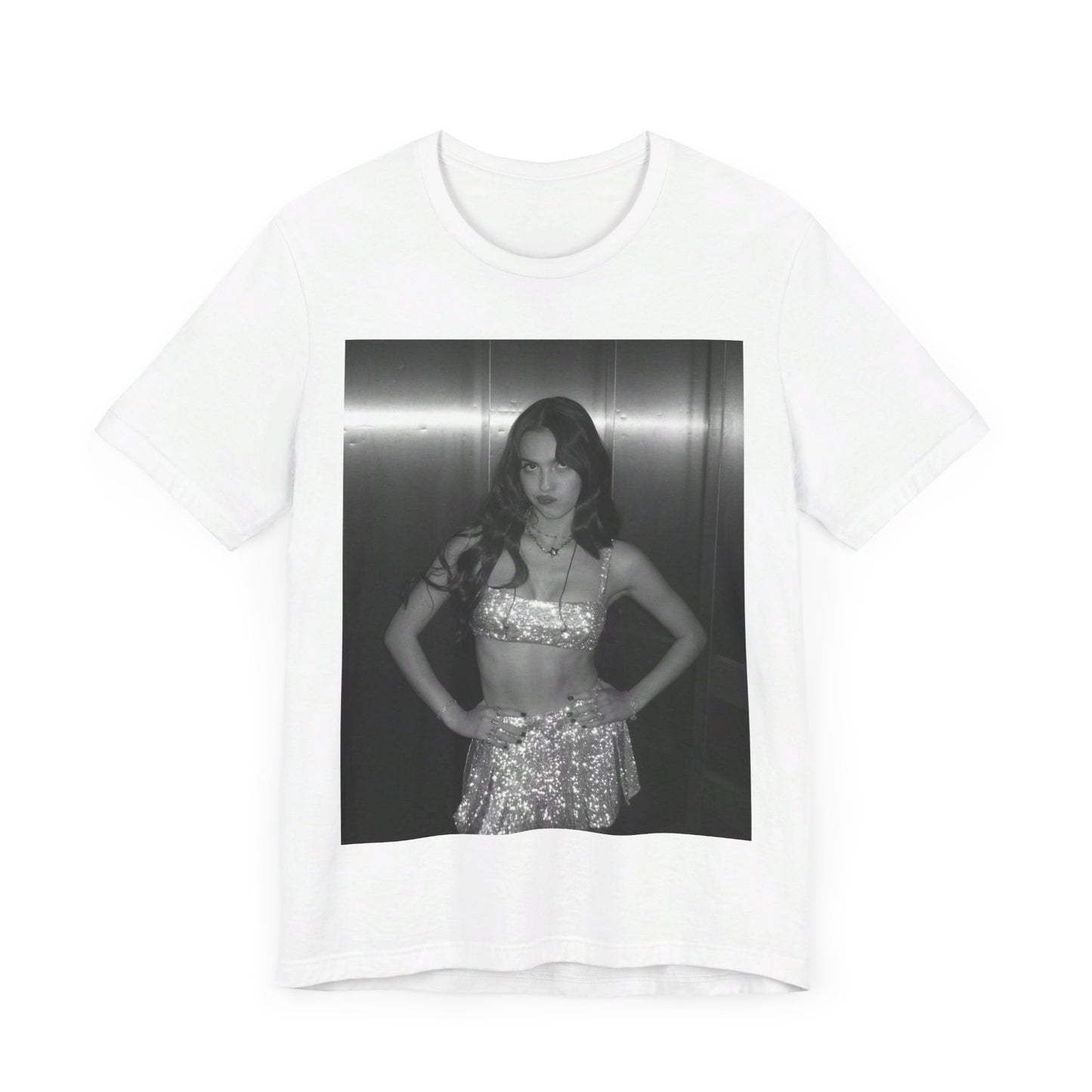 A black graphic t-shirt featuring a black and white portrait photo of Olivia Rodrigo.