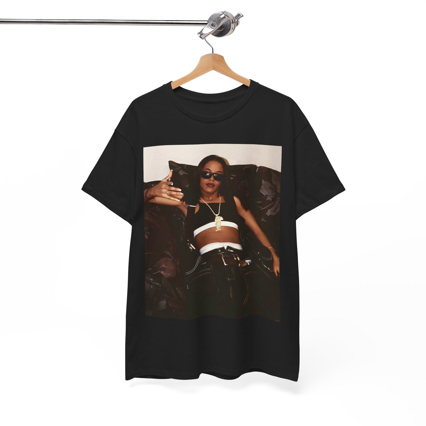 A black graphic t-shirt featuring a bold R&B superstar graphic of Aaliyah.