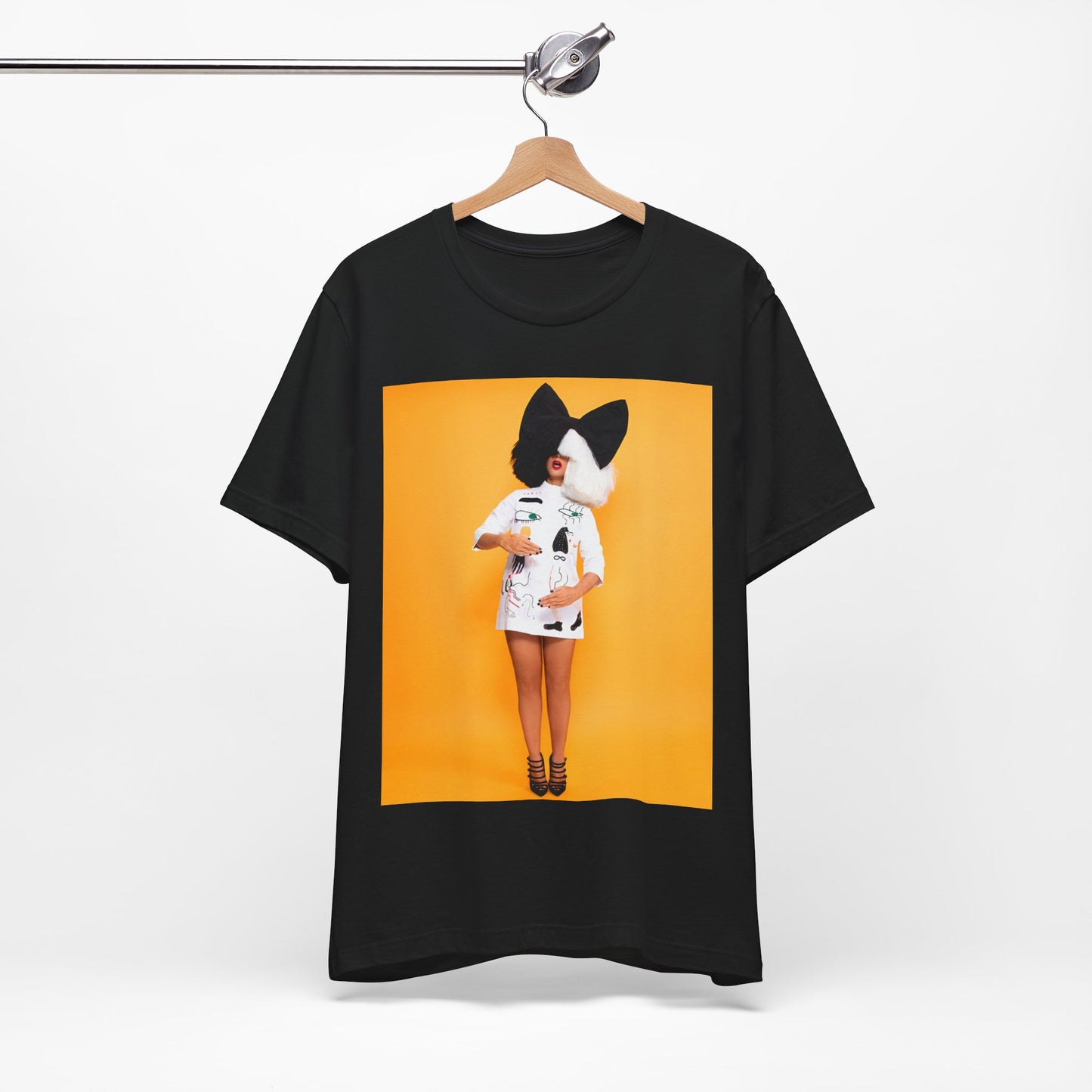 A black graphic t-shirt featuring a graphic of Sia as an art pop visionary.