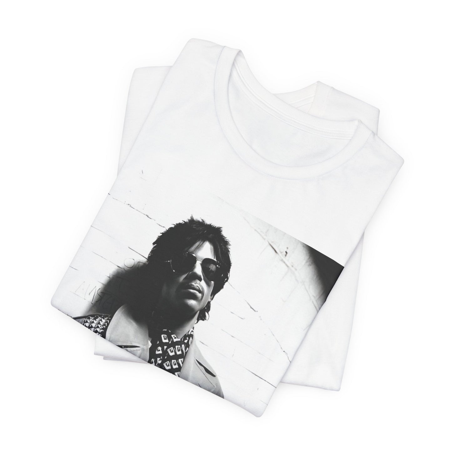 A black graphic t-shirt featuring Prince's iconic symbol, representing 'The Artist Formerly Known As'.