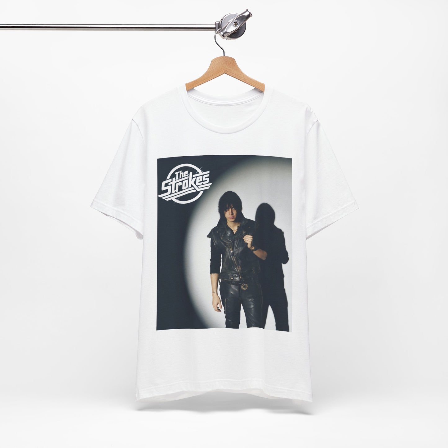 A black graphic t-shirt featuring a classic NYC garage rock graphic of The Strokes.