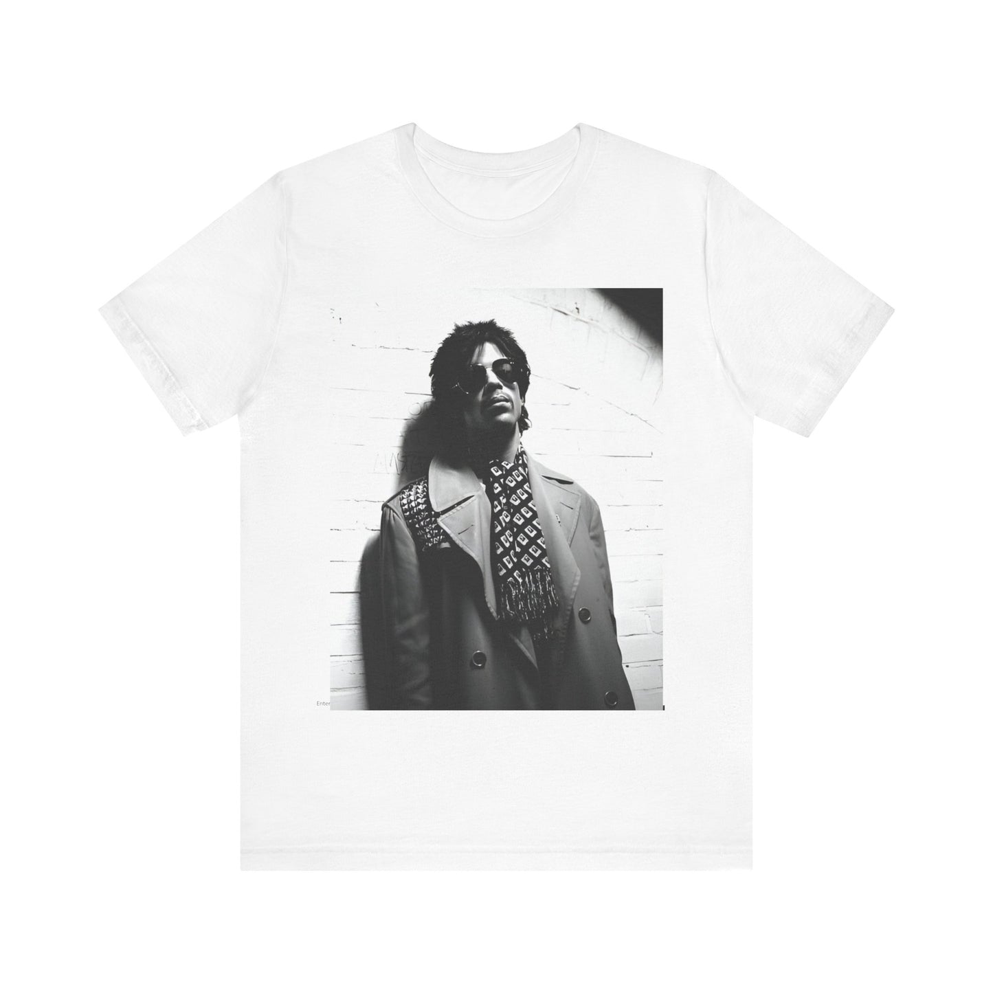 A black graphic t-shirt featuring Prince's iconic symbol, representing 'The Artist Formerly Known As'.