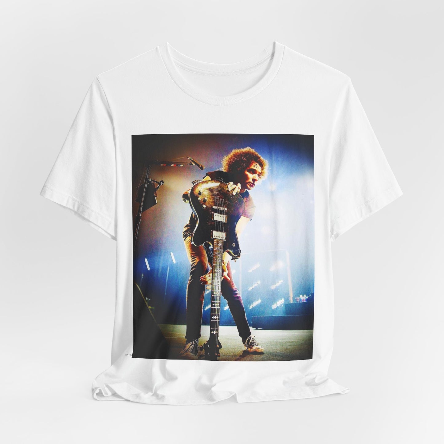 A black graphic t-shirt featuring a concert graphic for Alice In Chains' 2019 live show, with modern band imagery.