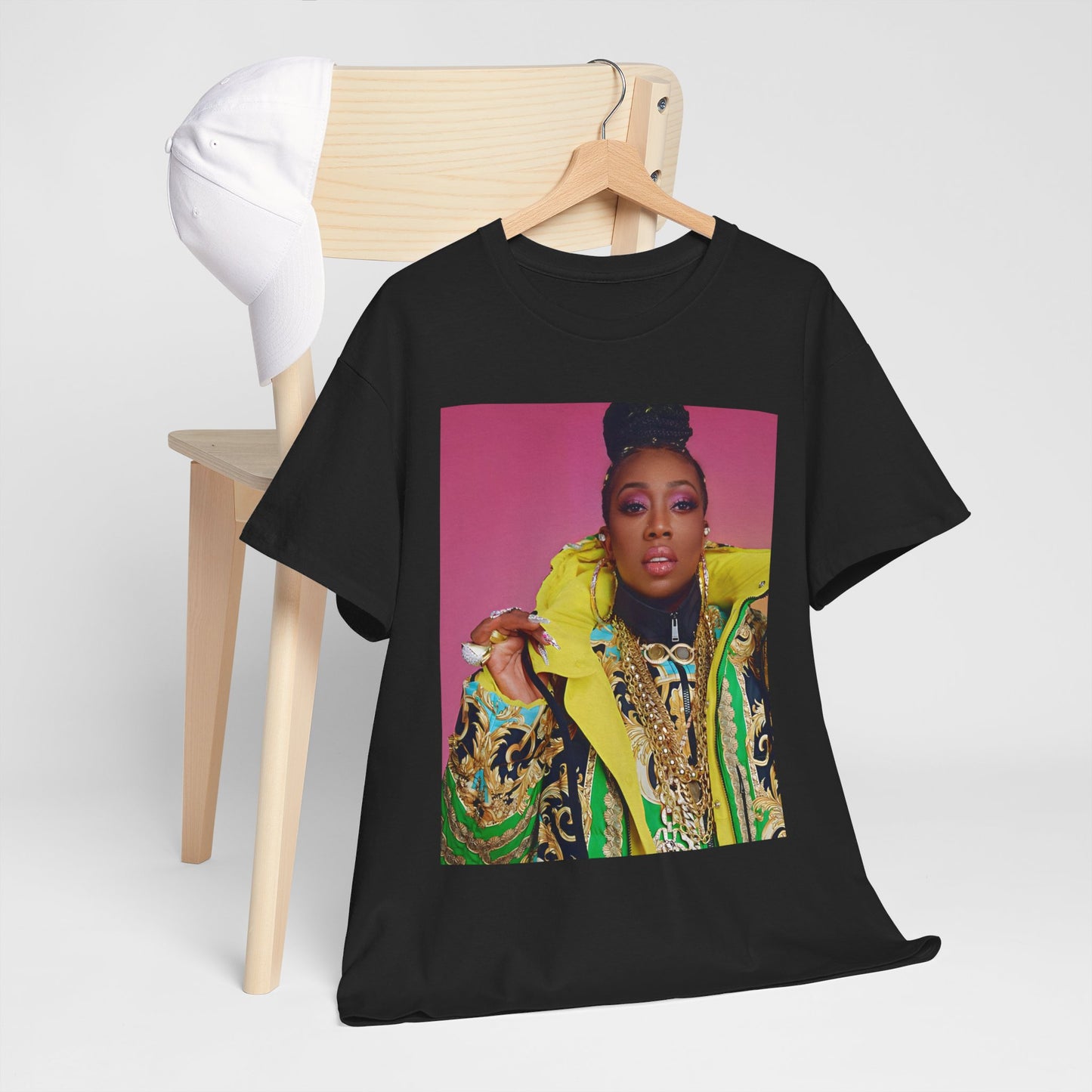 A black graphic t-shirt featuring a graphic of Missy Elliott as the rap queen of innovation.